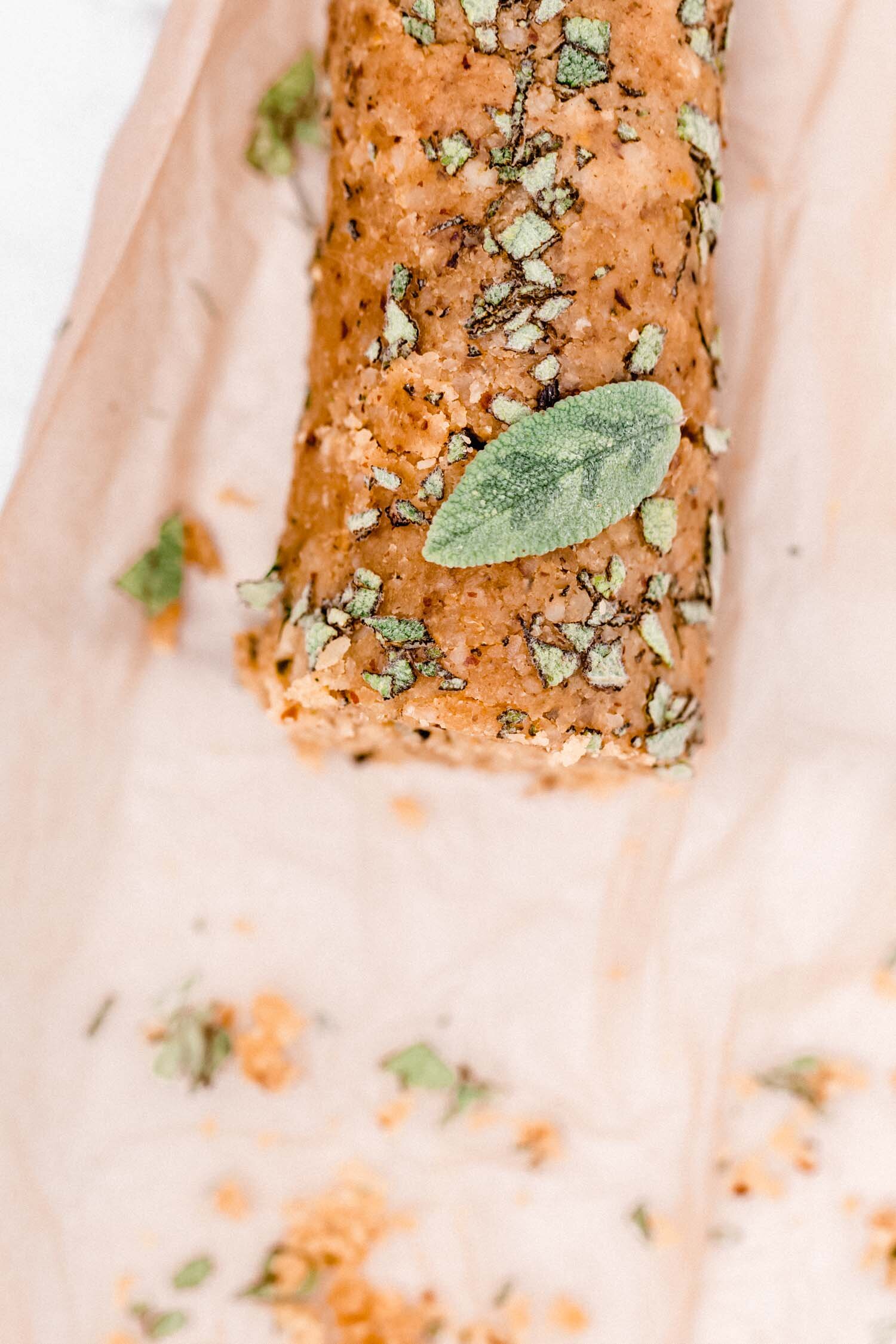 Easy Brazil Nut Vegan Cheese Log only requires about 10 minutes of hands-on time and is deliciously flavored with brazil nuts rosemary, lemon, and kalamata olives. #vegancheese #dairyfree #cheeselog #glutenfree #holidayfood #snack #appetizer #vegan #rosemary #brazilnut