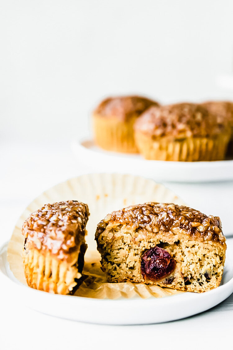 Easy Gluten-free Vegan Cranberry Orange Muffins with Maple Pecan Topping. Recipe &amp; photo by Kari | Beautiful Ingredient. #glutenfree #vegan #oat #muffins #breakfast #orange #cranberry #maple #bourbon #pecan