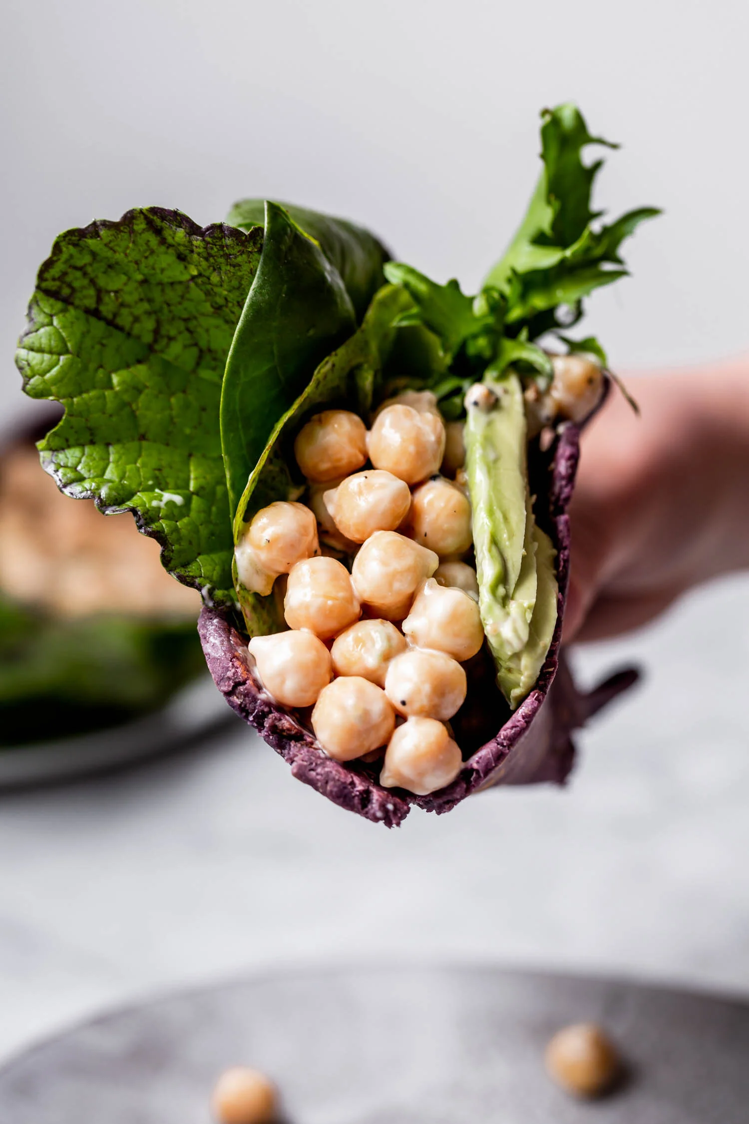 These Easy Potato Flatbreads only require two pantry staple ingredients and make great wraps, tortillas, naan, and pizza crust. By Kari of Beautiful Ingredient. #flatbread #homemade #potato #twoingredientrecipe #easyrecipe #vegan #glutenfree #nutfree #yeastfree #tortilla #purple #pizzacrust #naan #quickbread