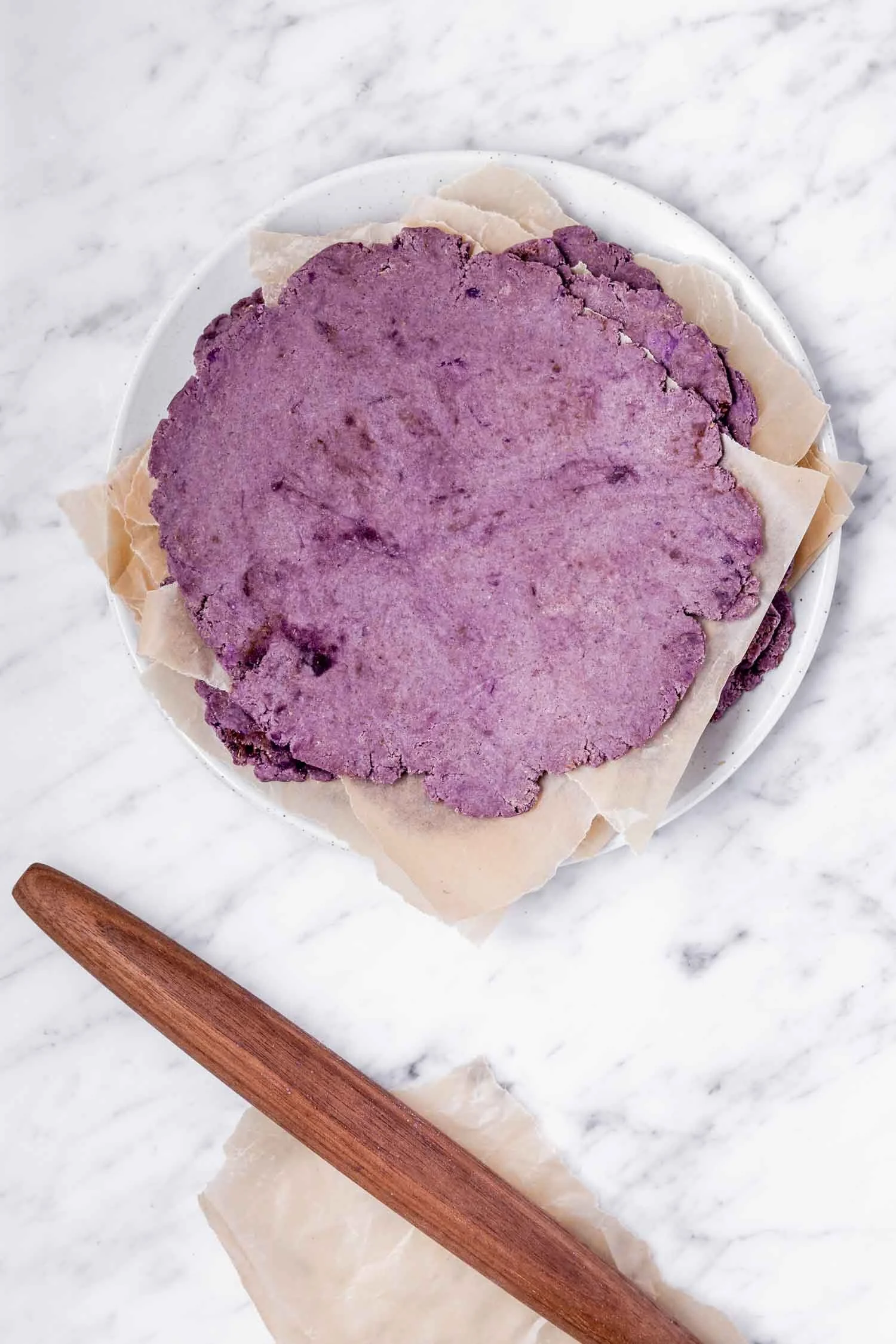These Easy Potato Flatbreads only require two pantry staple ingredients and make great wraps, tortillas, naan, and pizza crust. By Kari of Beautiful Ingredient. #flatbread #homemade #potato #twoingredientrecipe #easyrecipe #vegan #glutenfree #nutfree #yeastfree #tortilla #purple #pizzacrust #naan #quickbread