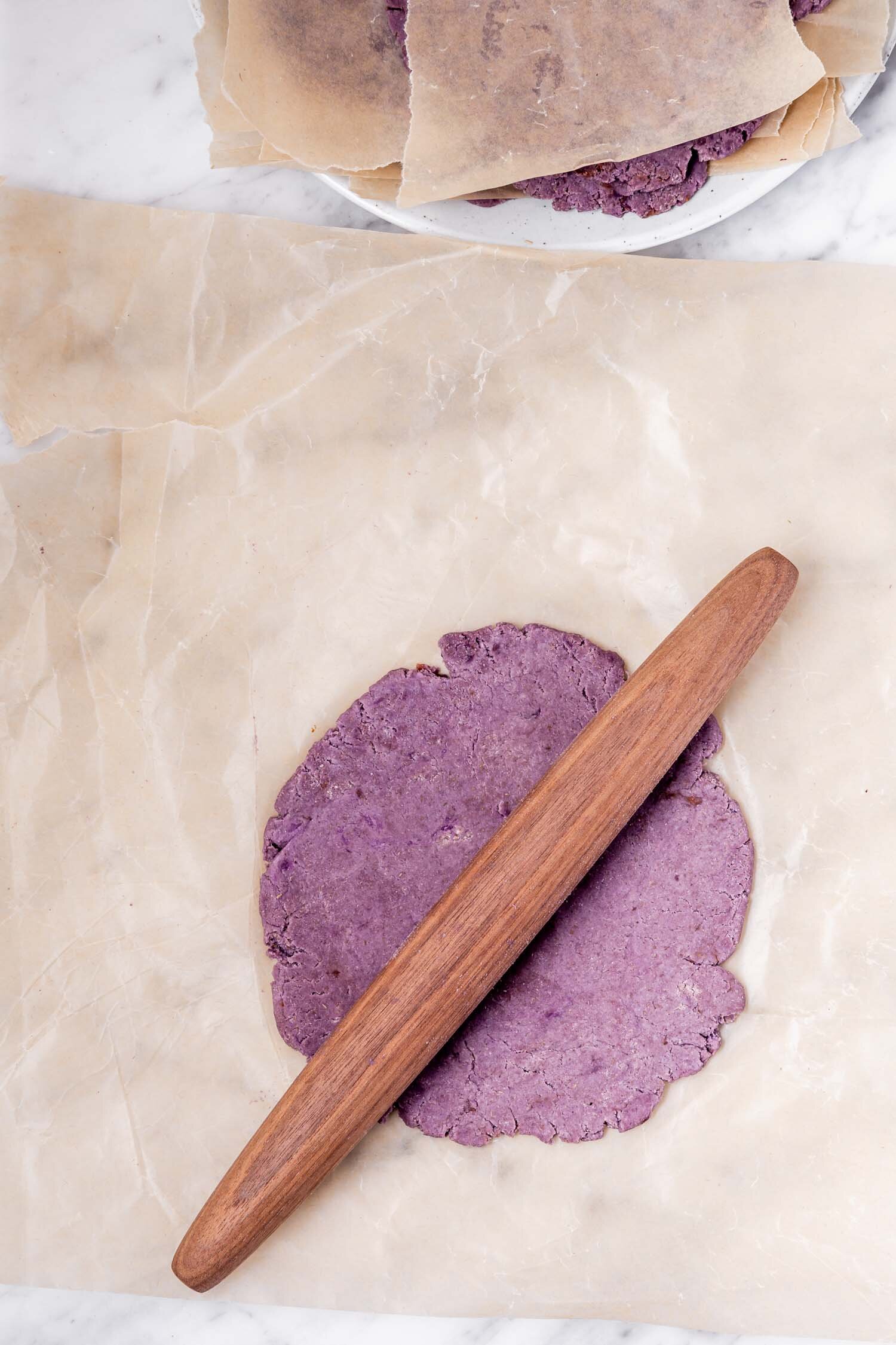These Easy Potato Flatbreads only require two pantry staple ingredients and make great wraps, tortillas, naan, and pizza crust. By Kari of Beautiful Ingredient. #flatbread #homemade #potato #twoingredientrecipe #easyrecipe #vegan #glutenfree #nutfree #yeastfree #tortilla #purple #pizzacrust #naan #quickbread
