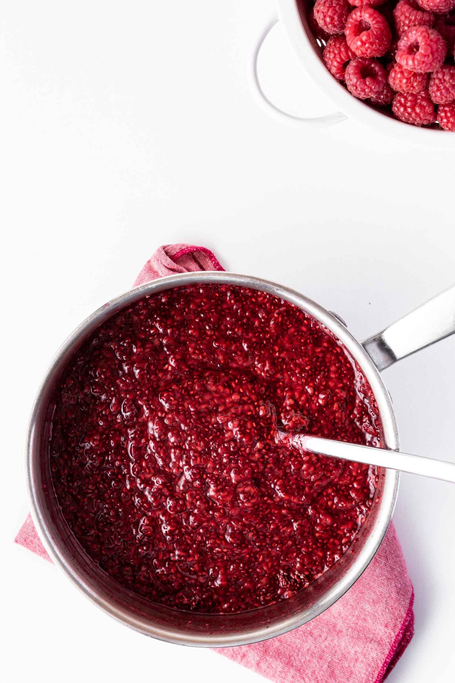 Raspberry Chia Jam, Raw or Cooked Recipe by Kari of Beautiful Ingredient. Two versions to enjoy in different ways, using the same ingredients. Nutrient-packed, refined sugar-free, and super quick &amp; easy. #rawveganrecipes #chiajam #raspberry #rawchiajam #rawveganjam #recipe #veganrecipe #recipesugarfree #sugarfreejam #jamrecipeseasy #jam #berry
