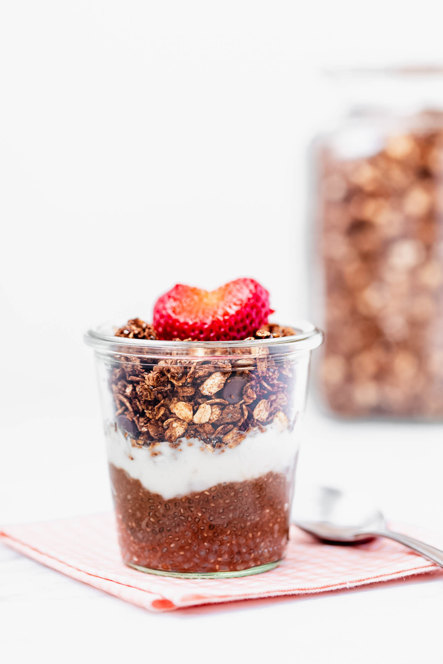 Chocolate and freeze-dried berries are the perfect combo in this crispy granola, inspired by store-bought granola. Vegan, gluten-free, oil-free, easy, with minimal prep time, yet makes a big batch. #granola #granolarecipe #vegangranola #oilfreevegan #sugarfree #vegangranolarecipe #veganbreakfast #quickbreakfast #quicksnack #vegansnack #breakfastideas #breakfastideashealthy #breakfastrecipes #glutenfreerecipes
