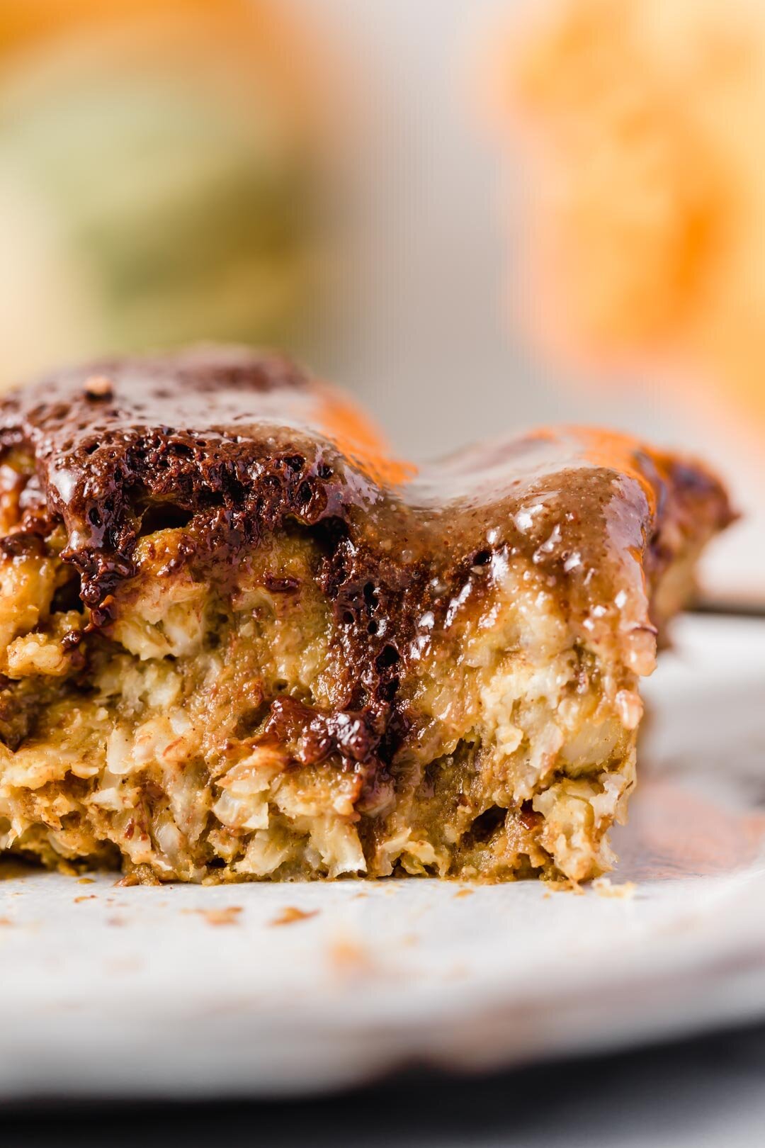 Vegan Pumpkin Chocolate Swirl Baked Oatmeal Pudding with Maple Pecan Sauce. By Kari at Beautiful Ingredient. Eat it by the gooey slice. Why you’ll love this recipe: Little effort is required. Ready in 30 minutes. Most people can eat it as it’s vegan, gluten-free, oil-free, refined sugar-free. Nutrient dense and delicious. Big batch makes enough for leftovers. Pumpkin spice + chocolate + maple pecan sauce oh my! If you’re missing a few ingredients, I’ve included options to still make it delicious. #bakedoatmeal #bakedoatmealrecipes #vegan #breakfastideas #veganbreakfast #veganbreakfastrecipes #veganrecipe #glutenfree #glutenfreebaking #refinedsugarfree #oilfree #chocolate #pumpkinspice #pumpkinrecipes #30minutesorless
