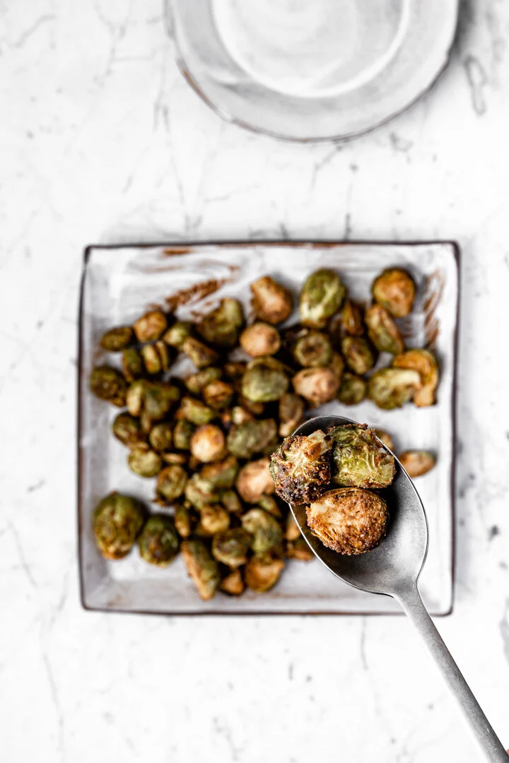 Oil-free Vegan Balsamic Maple Pecan Roasted Brussels Sprouts in the air fryer, with oven option. By Kari of Beautiful Ingredient. #brusselssprouts #airfryer #brusselssproutsairfryer #brusselssproutsrecipe #vegan #glutenfree #oilfree #recipe #veganrecipe #thanksgiving #christmas #holidayrecipe #fallrecipe #beautifulingredient #roastedvegetables #quickrecipe #crispy