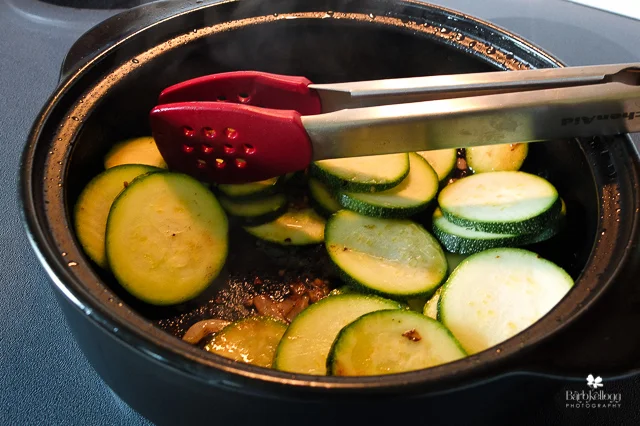 Sauteing zucchini, shallots and garlic
