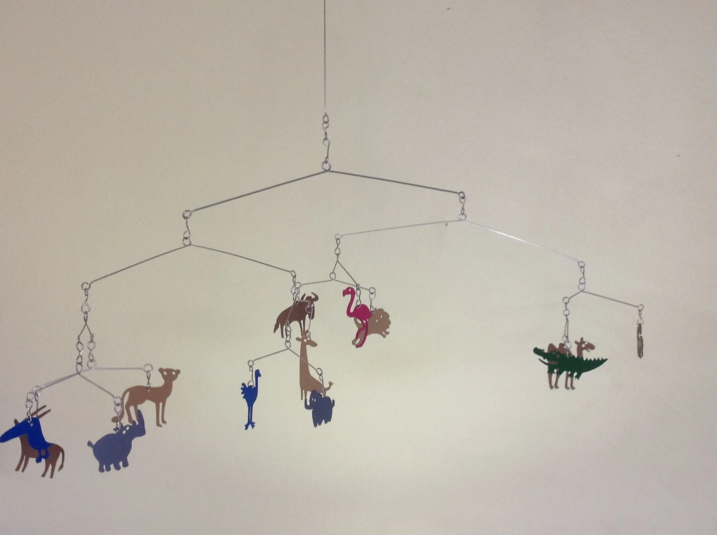 Painted metal and wire mobile 