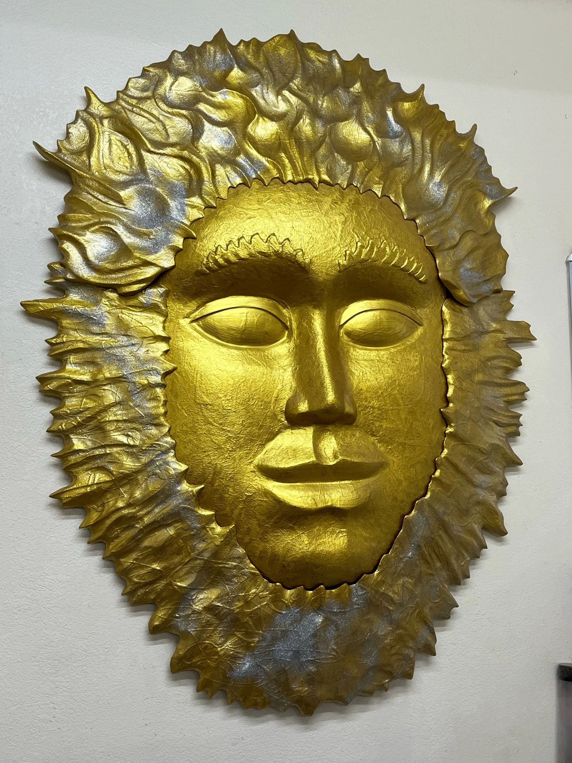 Apollo gold and silver sun sculpture