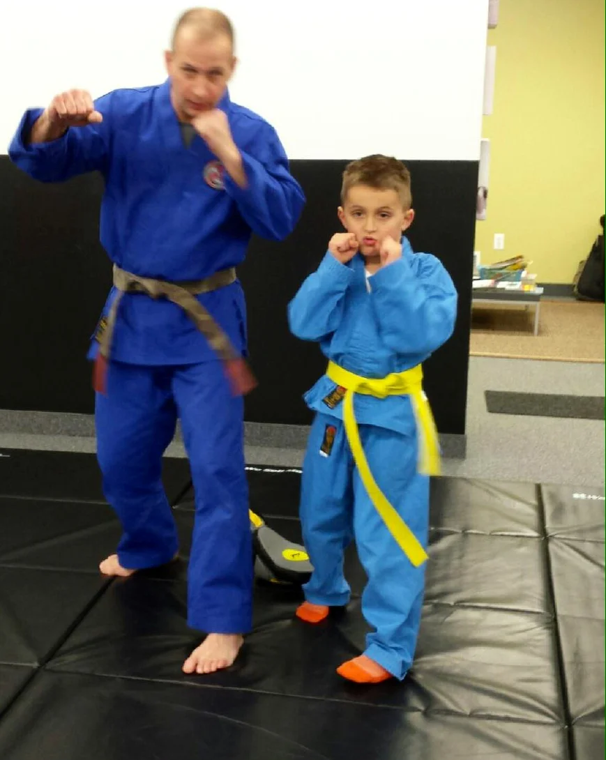Wojtas orange belt test Zach and Dave.jpg