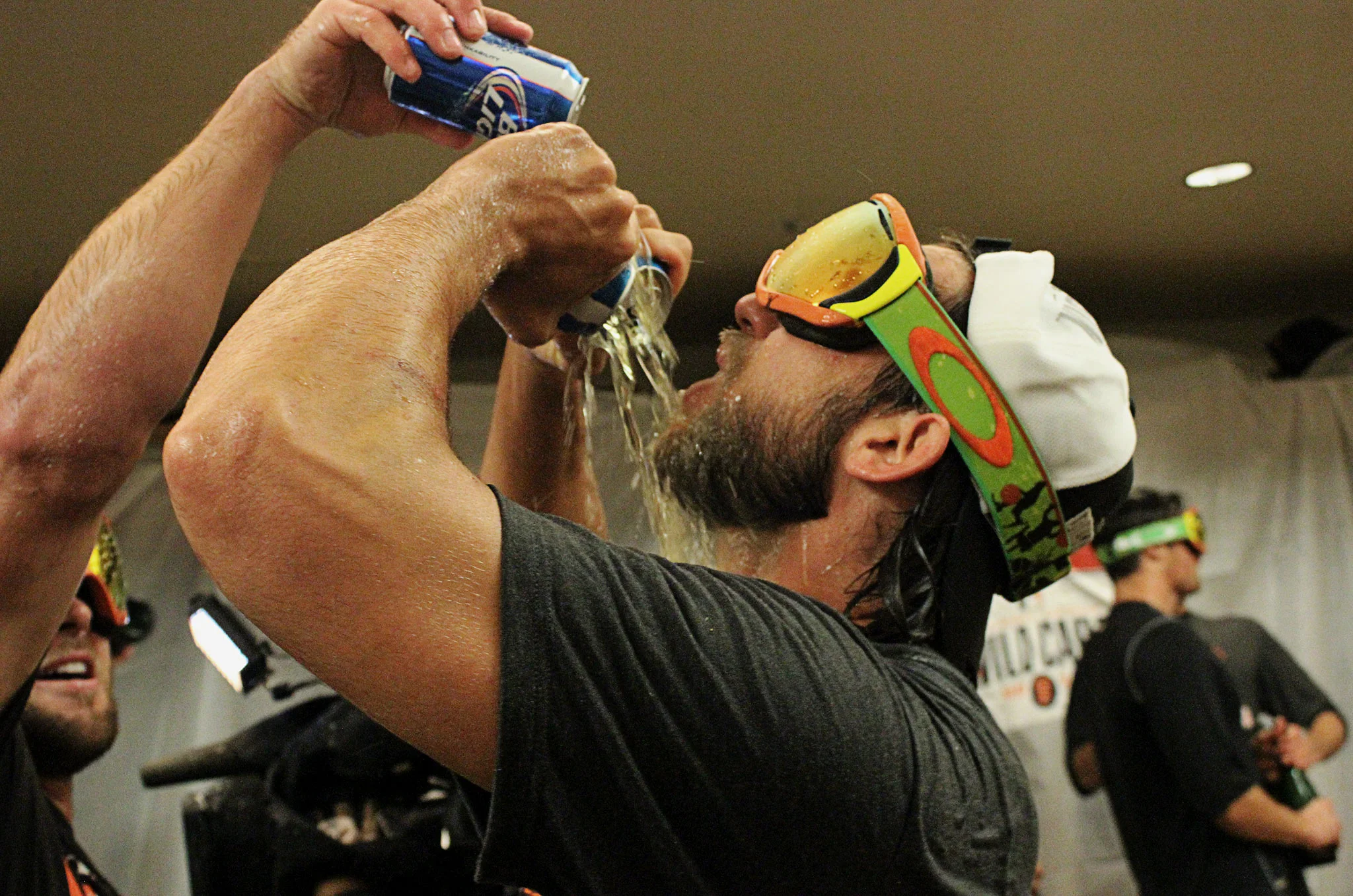 Madison Bumgarner chugs beer and celebrates the San Francisco Giants postseason berth with his teammates in the Giants clubhouse after a game against the San Diego Padres at AT&T Park on Thursday, September 25, 2014 in San Francisco.