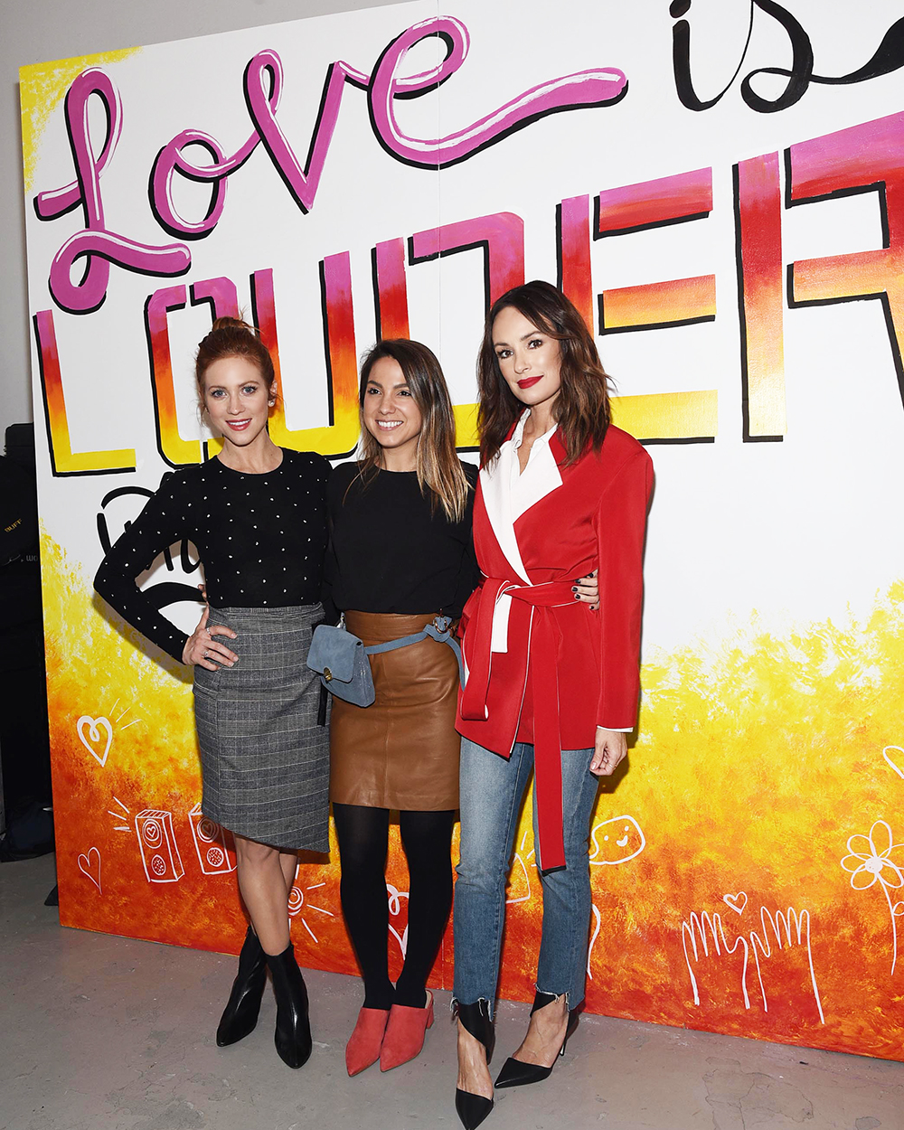 Brittany Snow , SIMPLY founder Sarah Boyd , and Catt Sadler at the Love Is Louder art wall