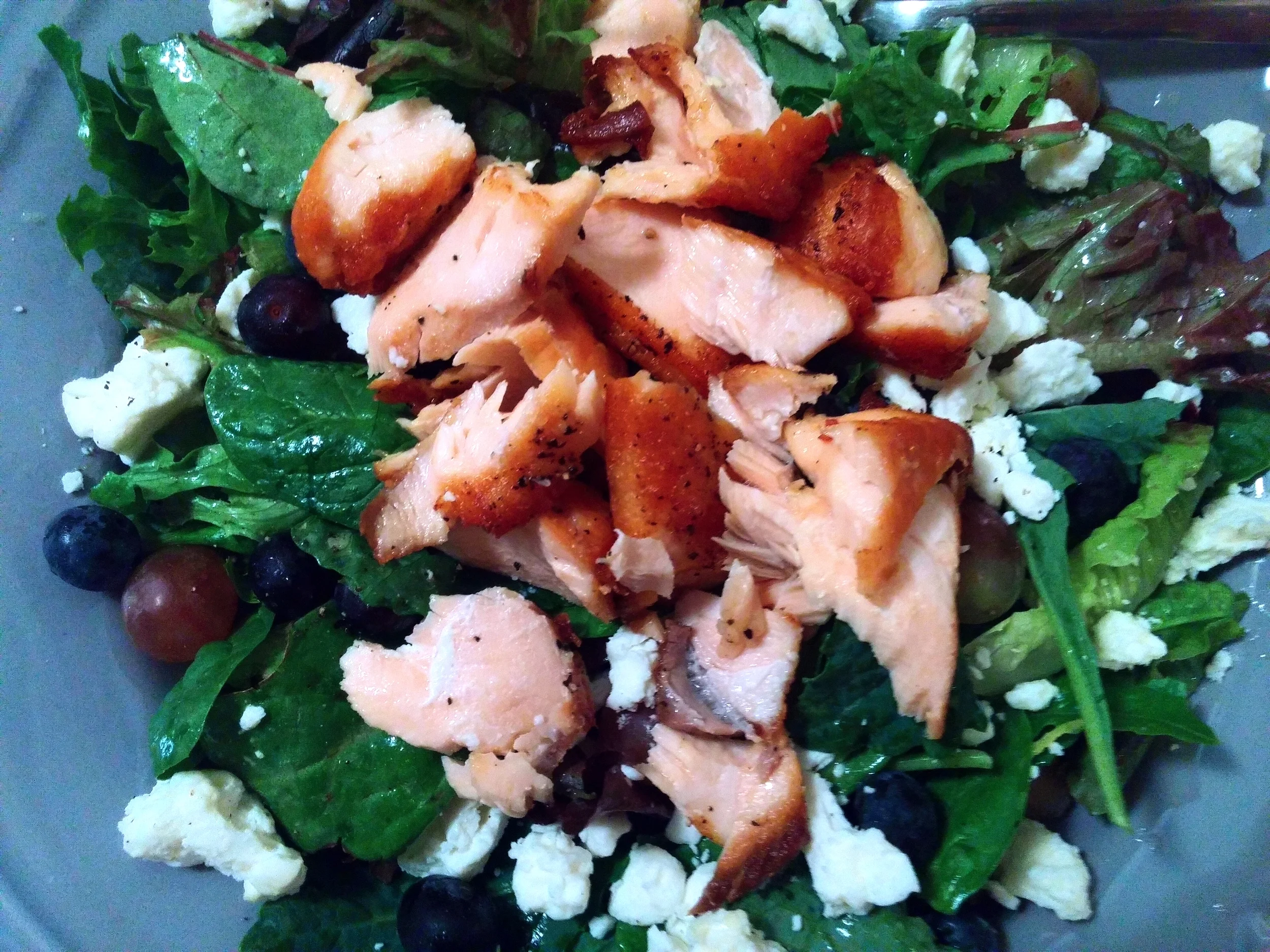A Shallot, Citrus Salmon Salad with Seasonal Toppings