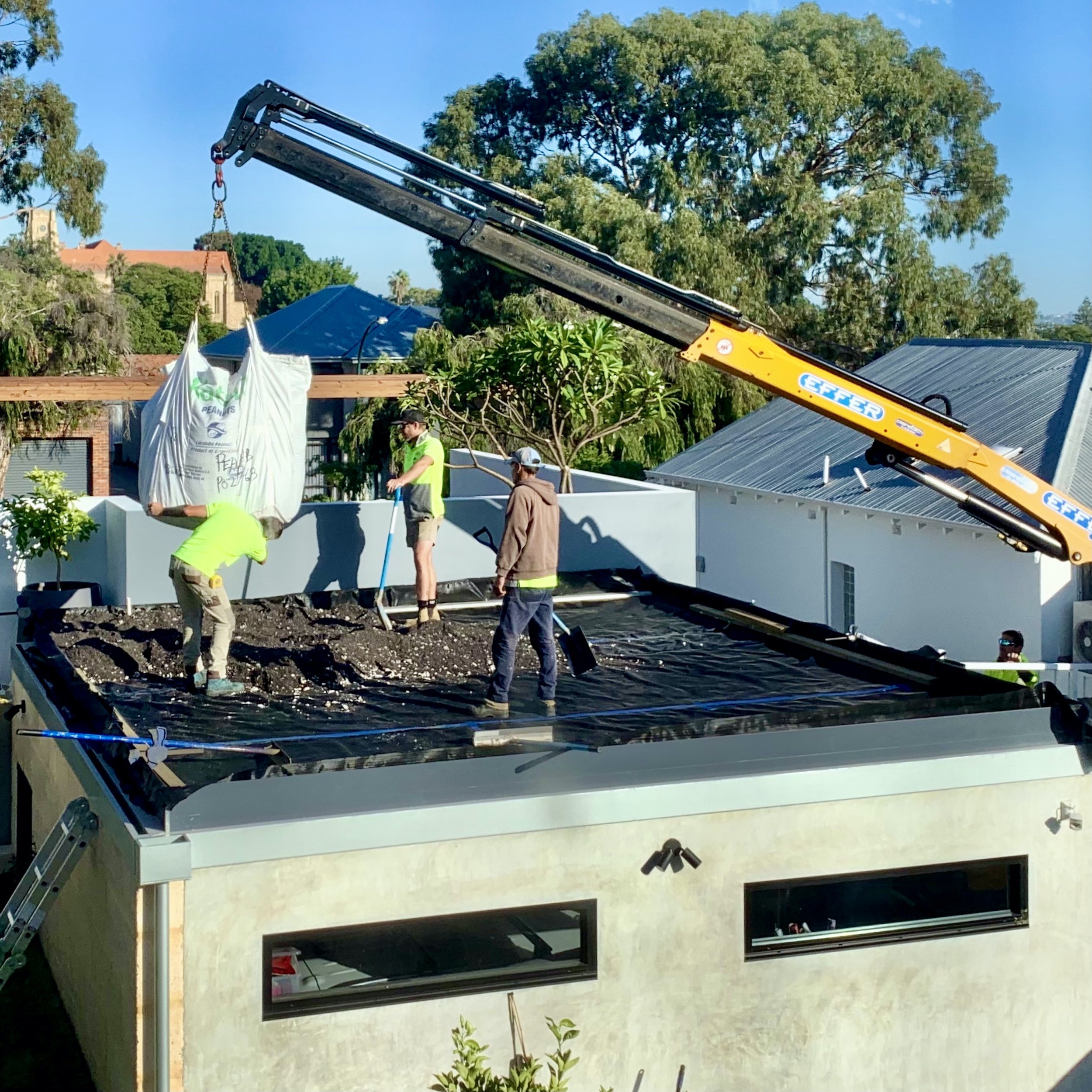 installing the soil mix over the drainage cell