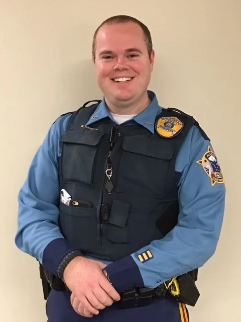 Trooper Matthew Iverson Alaska State Troopers Detachment D Trooper Iverson is assigned to the Fairbanks Roving Rural Unit, so he routinely responds to calls for service from the rural communities in Interior Alaska. Trooper Iverson was selected as D Detachment’s 2015 Trooper of the Year because of his tenacious work ethic and positive attitude. Before Iverson became a Trooper, he worked 3.5 years at a maximum security correctional facility in Dallas, Texas. He has served 4 years as a State Trooper, and is currently working on becoming an investigator with the Alaska Bureau of Investigations (ABI). Iverson grew up in the Northeastern part of Pennsylvania, then graduated high school in California. He worked several jobs outside of policing and investigations, including: working on a ranch, at a Sylvan Learning Center, and at a Starbucks as a shift supervisor and barista. He enjoys spending his free time with his friends and his 1-year-old pit bull. On the job, he loves being able to travel around the state while serving Alaska’s citizens. He gets to see a wide array of cultures and people, while also serving them as an officer and helping them with what they need.
