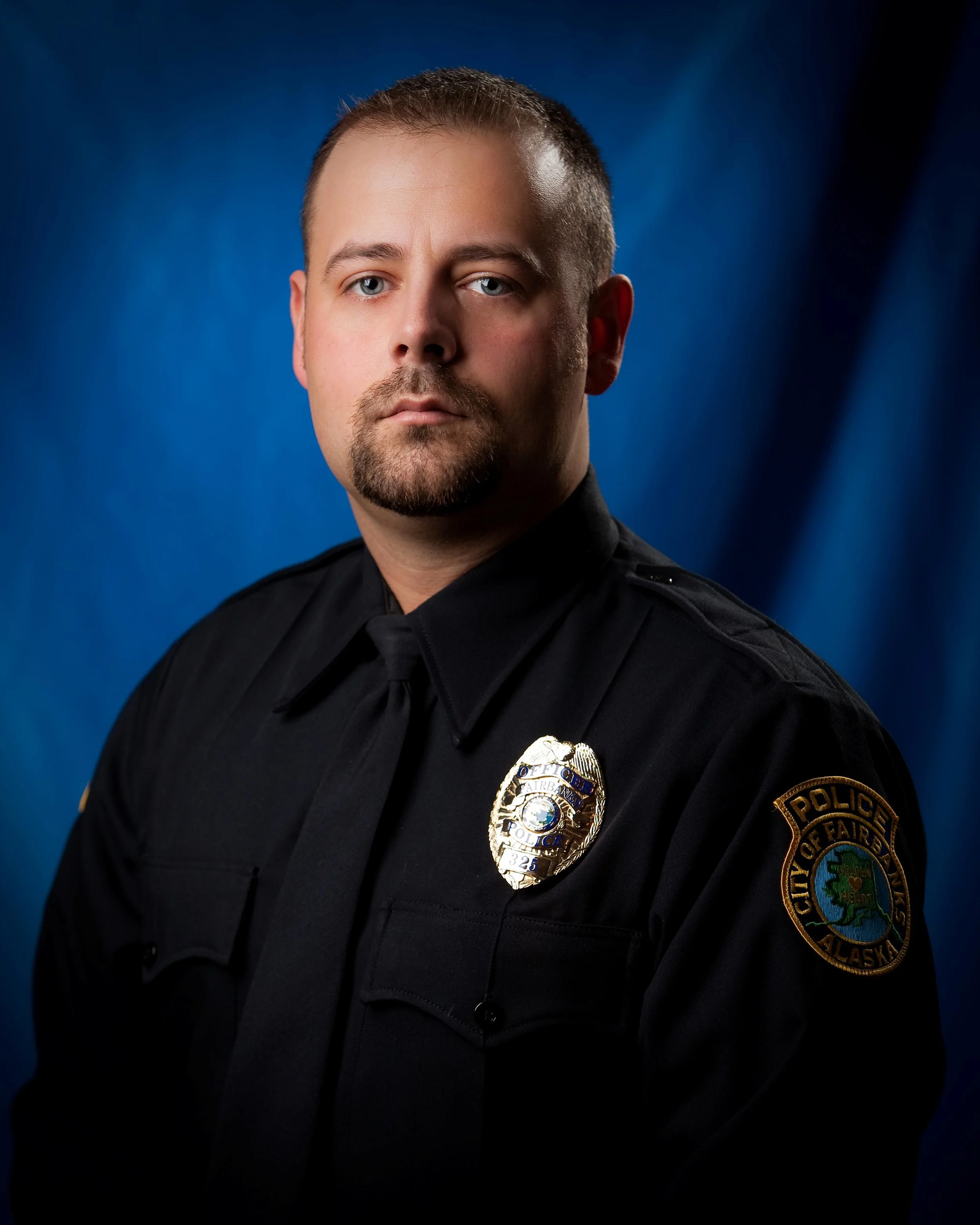 Officer Robert Hall City of Fairbanks Police Department Robert Hall has been a Fairbanks Police Officer since 2009. Prior to coming to work for the City of Fairbanks, Officer Hall was a Correctional Officer from 2006-2009. He also served our country as a Security Forces member in the Alaska Air National Guard from 2000-2012. Officer Hall is a K-9 handler and has been with his trusted partner, “Stryker” since 2013. Officer Hall and Stryker make a great team and consistently train in drug detection, tracking of suspects, building searches, warrant services, and public/educational demonstrations. Hall is called in his off duty time throughout the year by FPD and other surrounding law enforcement agencies to assist due to his K-9 experience. He also makes appearances at local events throughout the year such as Mush for Kids, Youth Day, and the Midnight Sun Street Fair. Since 2010, he has acted as the Interior point of contact for the Special Olympics Law Enforcement Torch Run. This has entailed working with the State of Alaska Special Olympics on coordinating the run and law enforcement volunteers, which has raised an average of $8,000 a year. Robert spent 2014 as the assistant coach for Special Olympics track and was the head coach in 2015 before passing the torch. He has also helped put on the Law Enforcement Torch Run “Tip a Cop” dinner. 