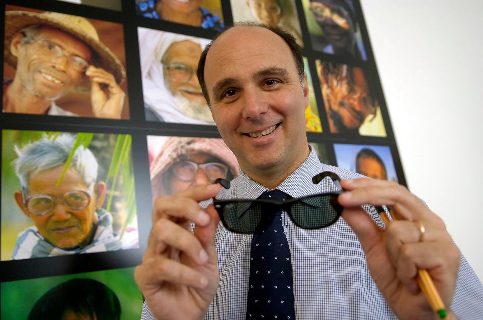 Luxottica Chief Executive Andrea Guerra Holding A Pair Of Ray Bans (Giuseppe Aresu/Bloomberg News)
