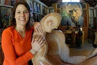 Katherine Quinn poses with one of Anthony Quinn's sculptures