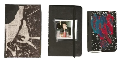 some of the many pocket journals Laster carries with her
