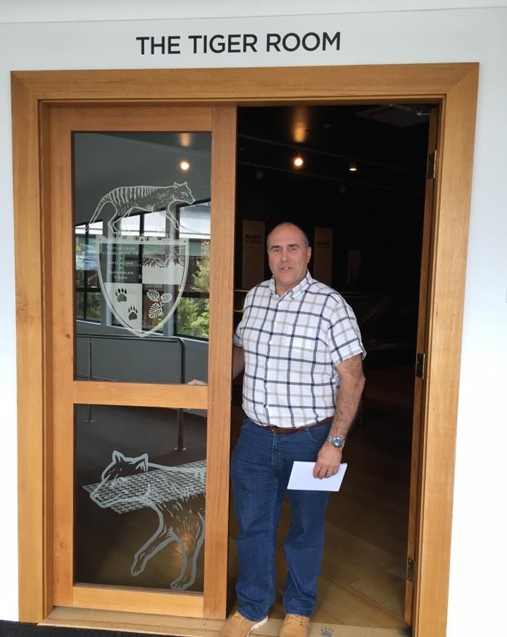 RACT CEO at entrance to The Tiger Room.jpg