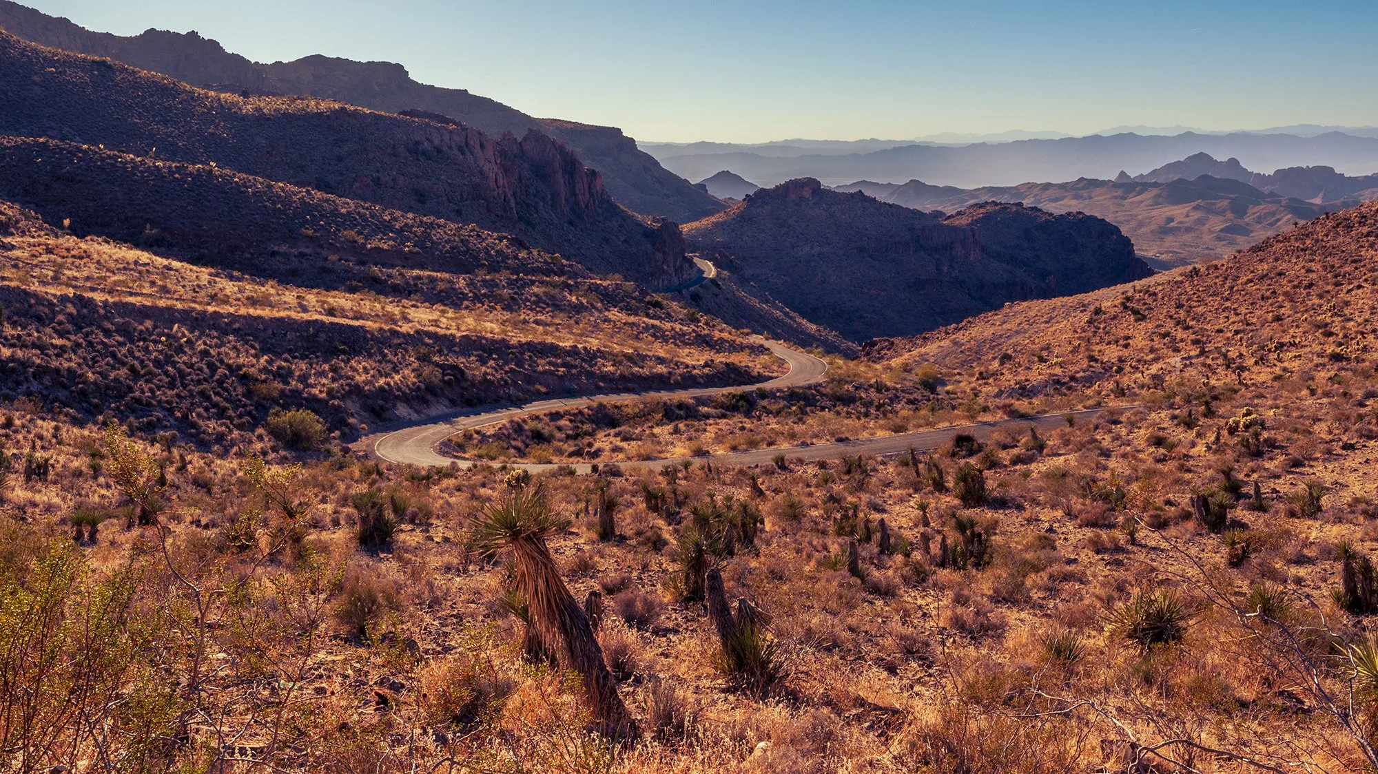  “Winding 66”  Route 66 may be synonymous with long straight roads.  But the westbound section before Las Vegas turns into a long series of hairpin bends.  And a terrain that is pure landscape.  