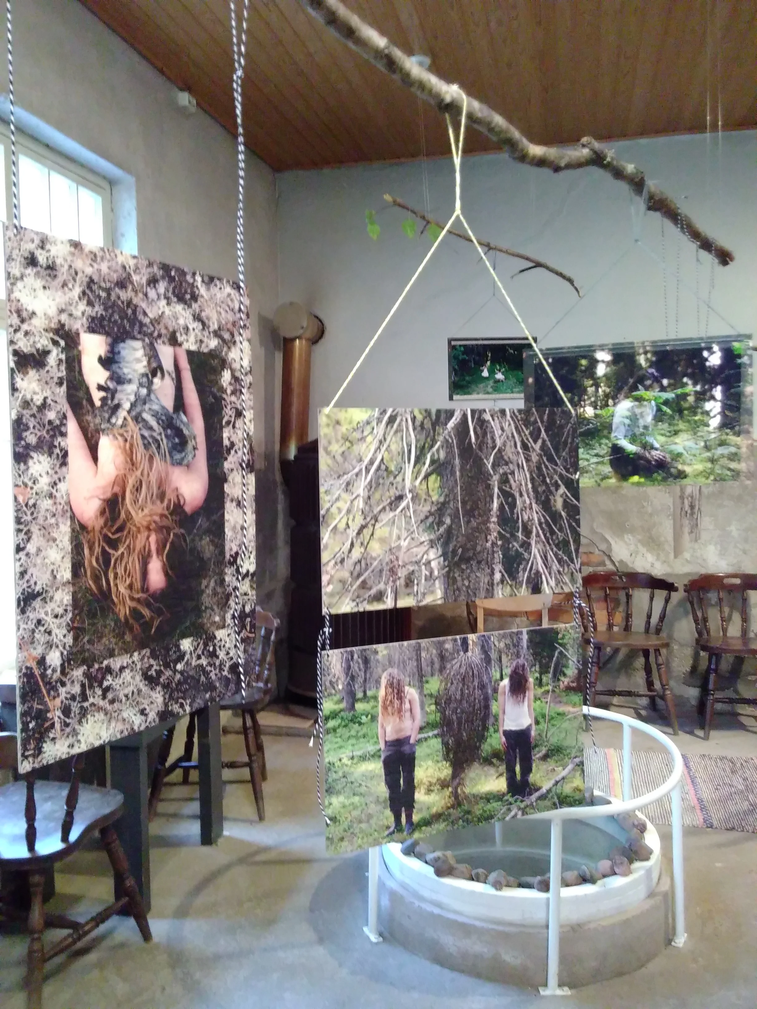 More exhibition pictures. You can see the water flowing below from the circle surrounded by stones there in the room.
