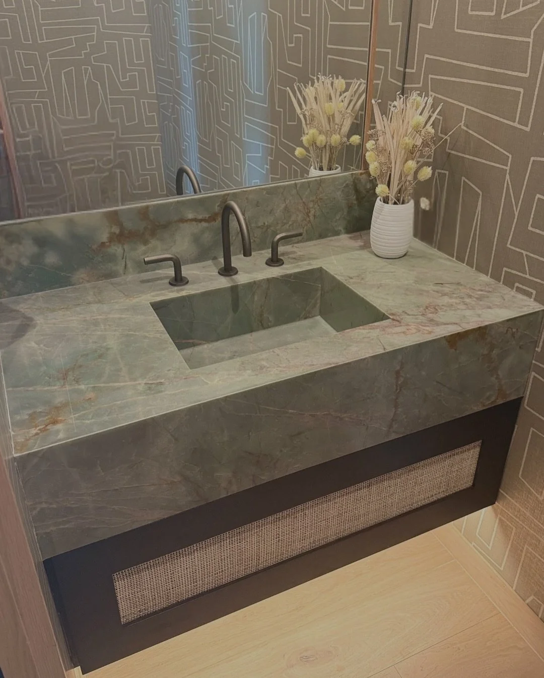 An unforgettable powder bath moment! Aqua Quartzite takes center stage with a fully integrated sink and seamless front apron&mdash;where design meets pure fluidity.

#stonemode #luxury #stone #dallasinteriordesign #stonedesign #design #custom #counte