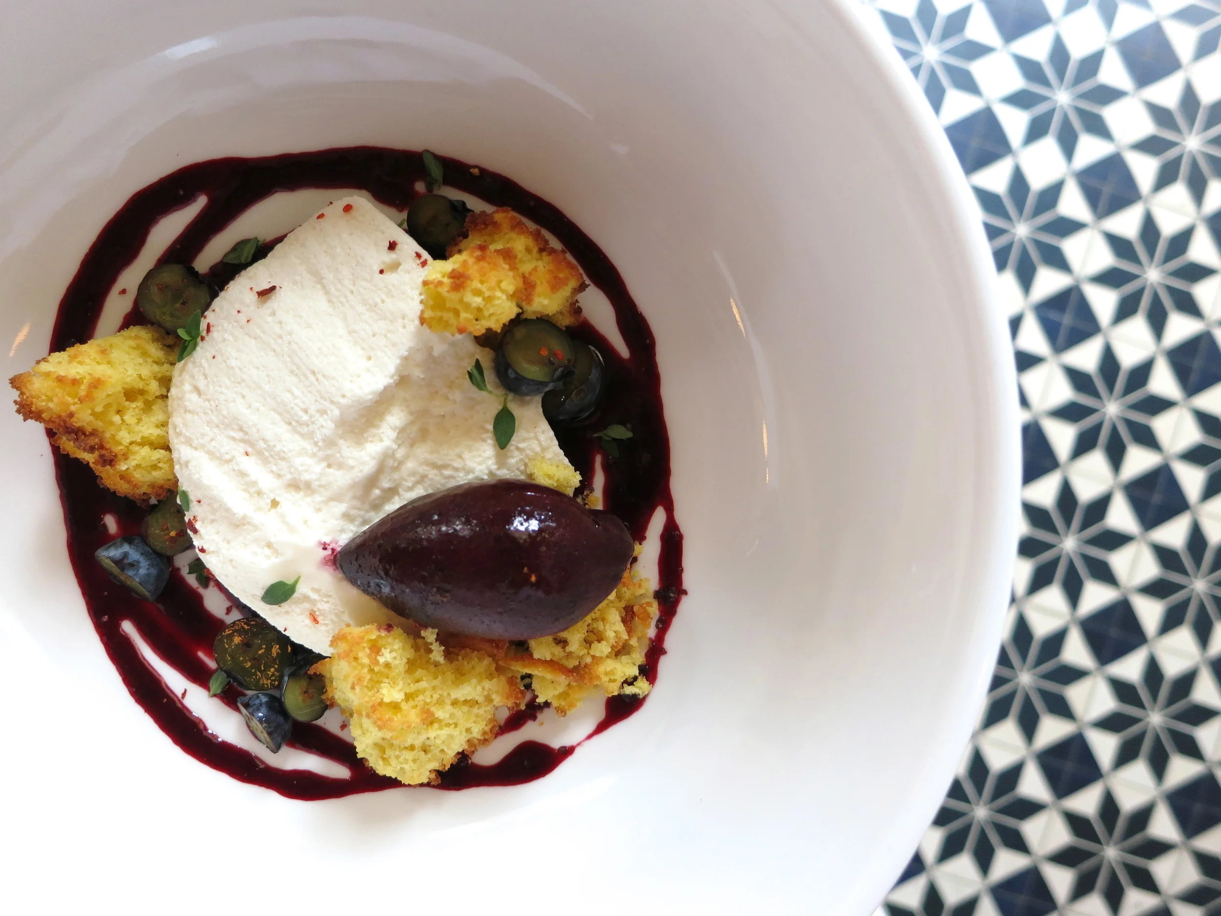 sweet cheese cremant with pickled blueberry