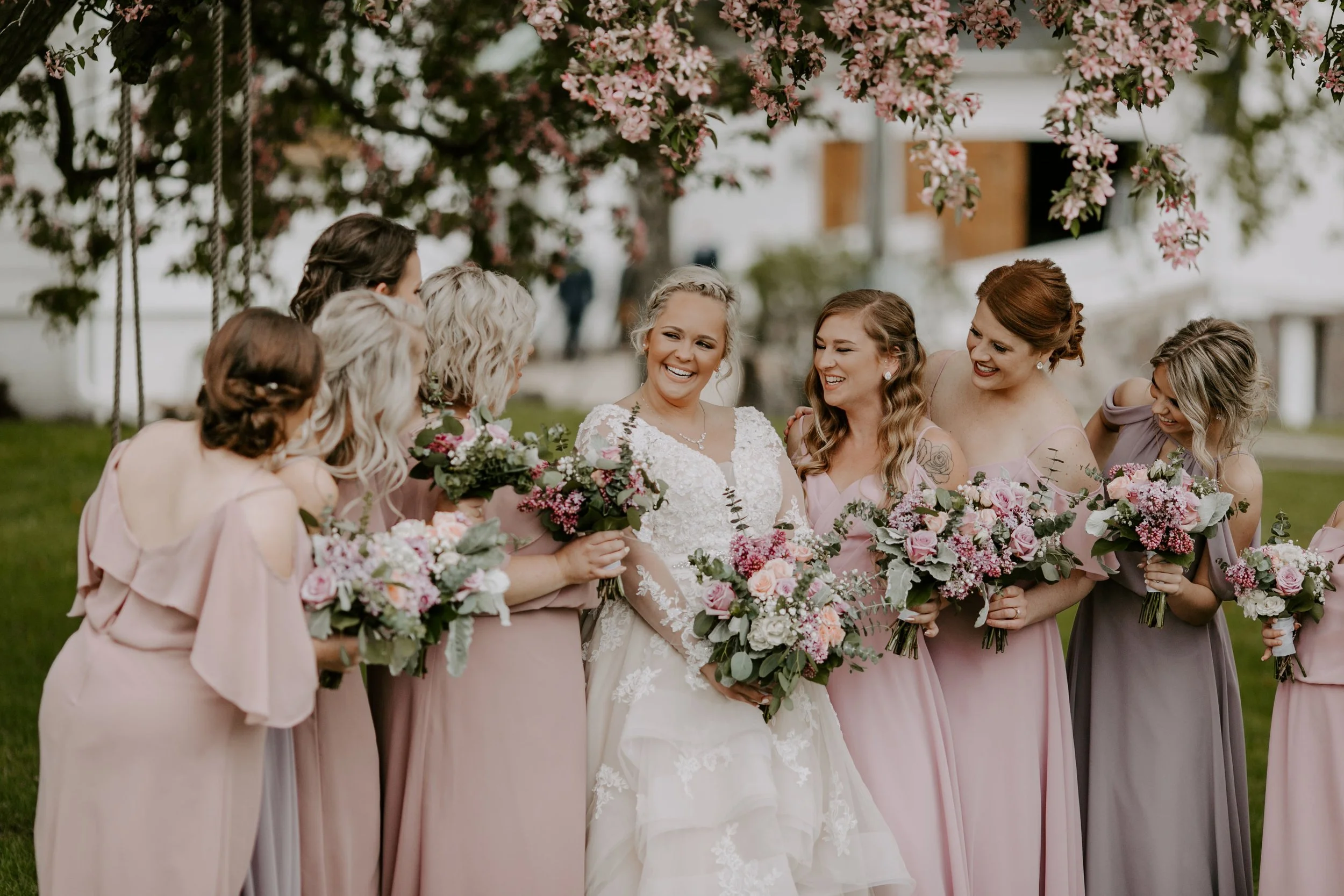 Blooming trees at the cottage farmhouse outdoor indoor wedding venue in mn