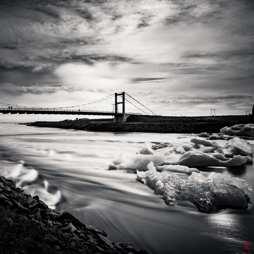 Water from Jökulsárlón streaming out at low tide.