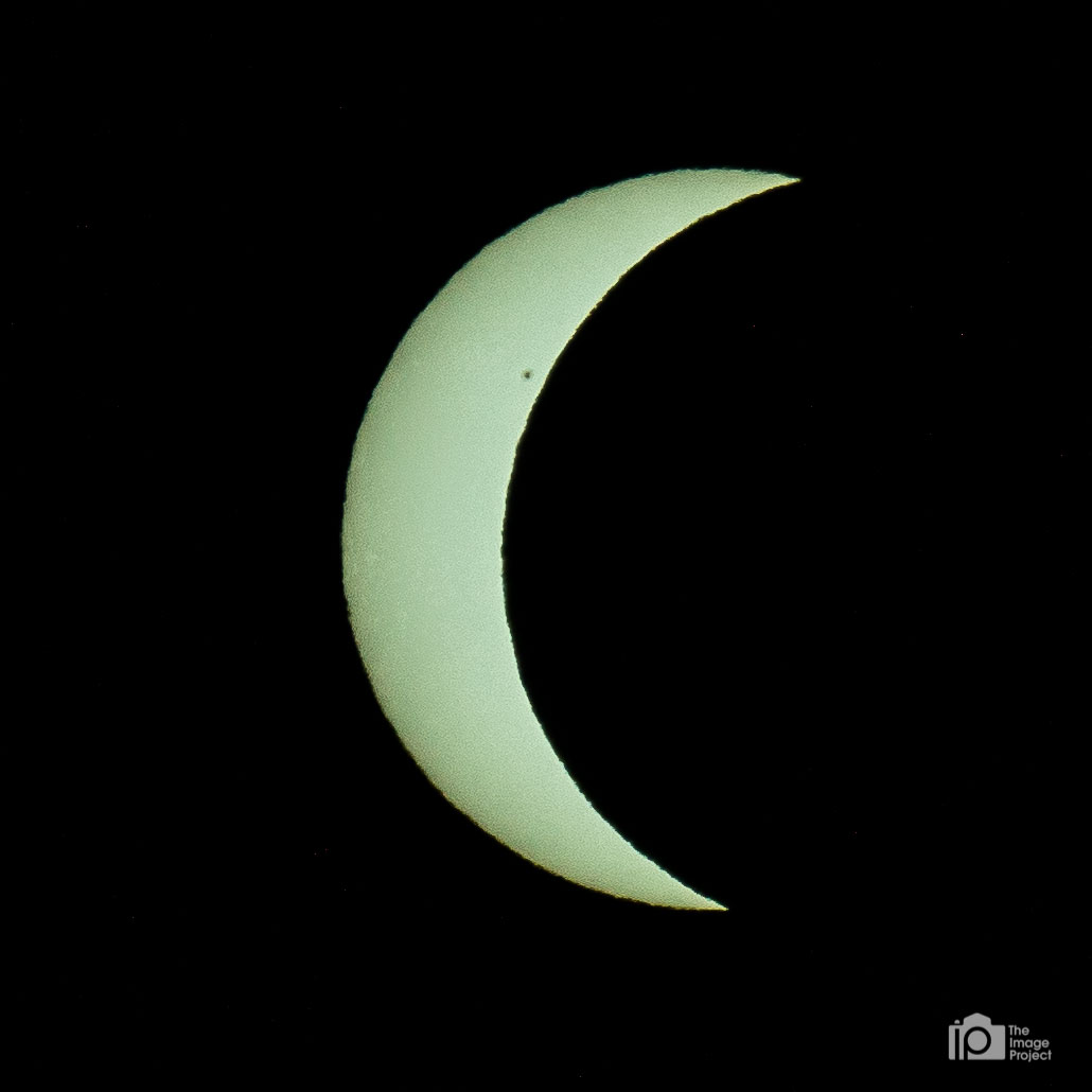 Presume that's a sunspot! Taken approx totality - 15 min, via 16 stops-worth of filtering
