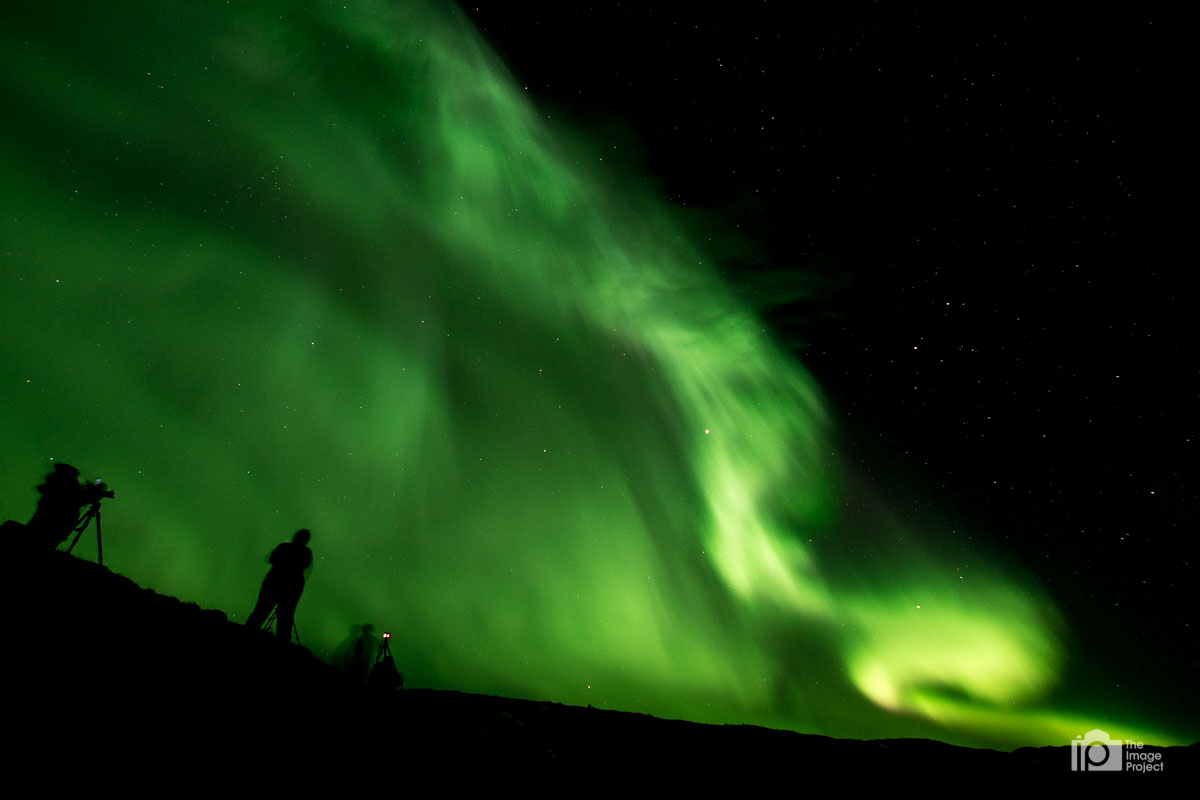 Earthlings desperately trying to capture the scene exploding above them!