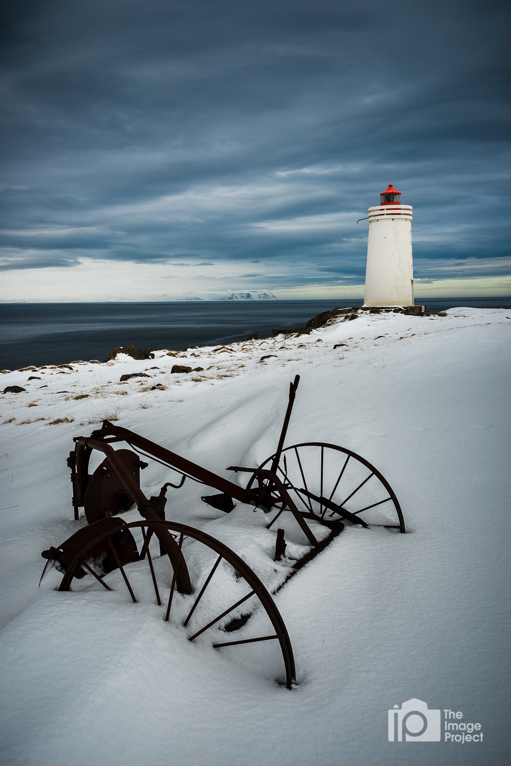 lighthouse and plough in the snow north iceland by nathan barry the image project in winter