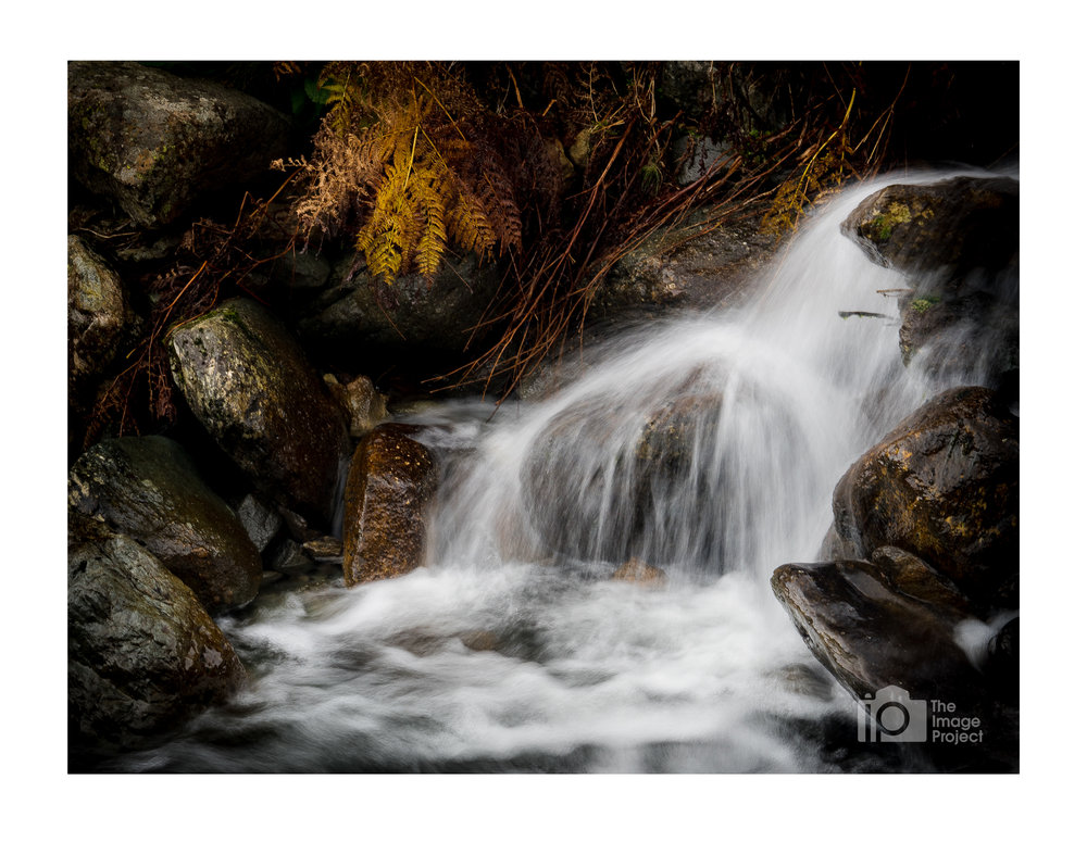 Water cascades into rockpool, near Brotherswater