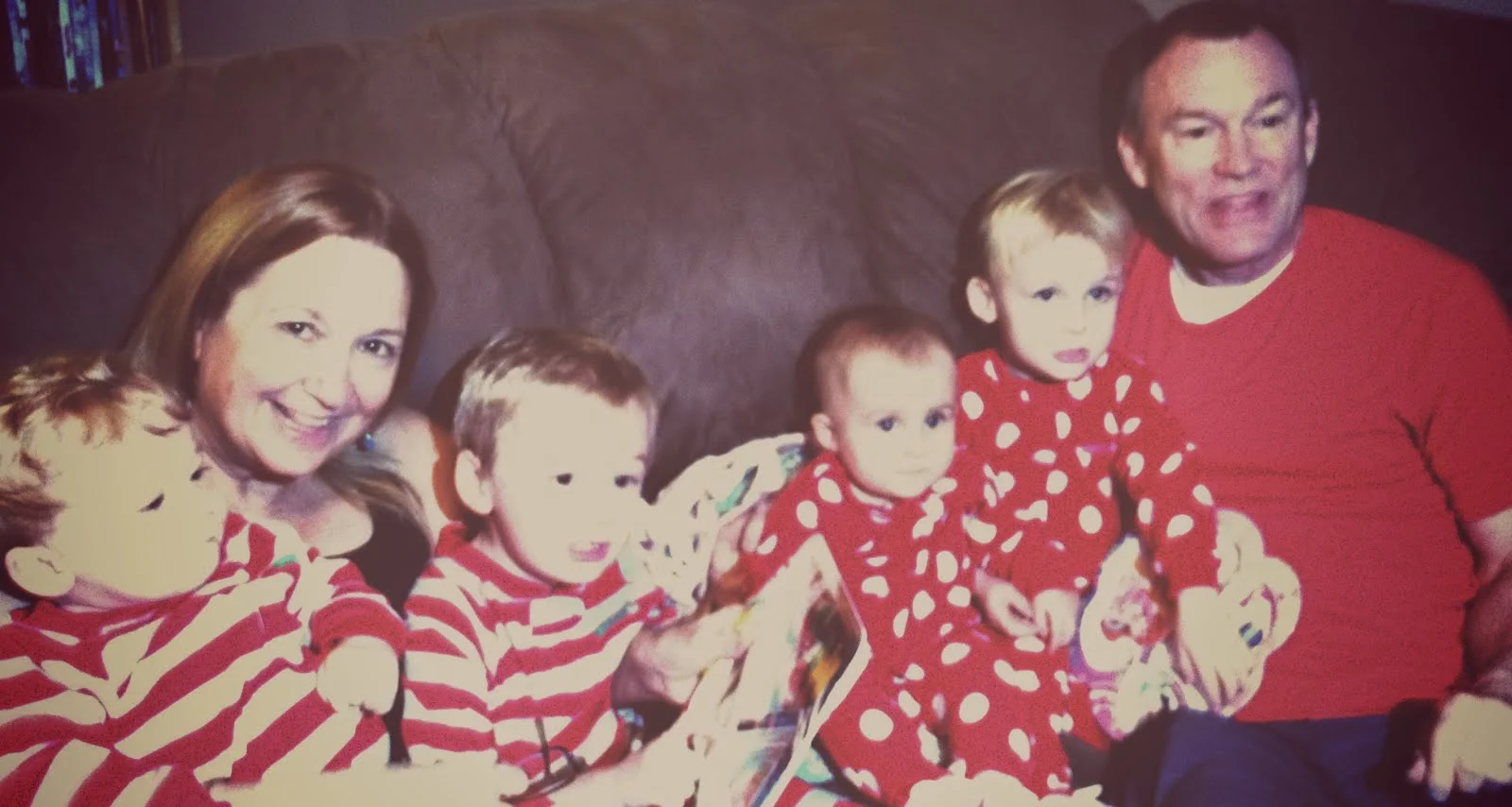 Grandparents with the grandkids(looks like 1962 cuz this filter offered the least blurry result-4 kids do not sit still at the same time)