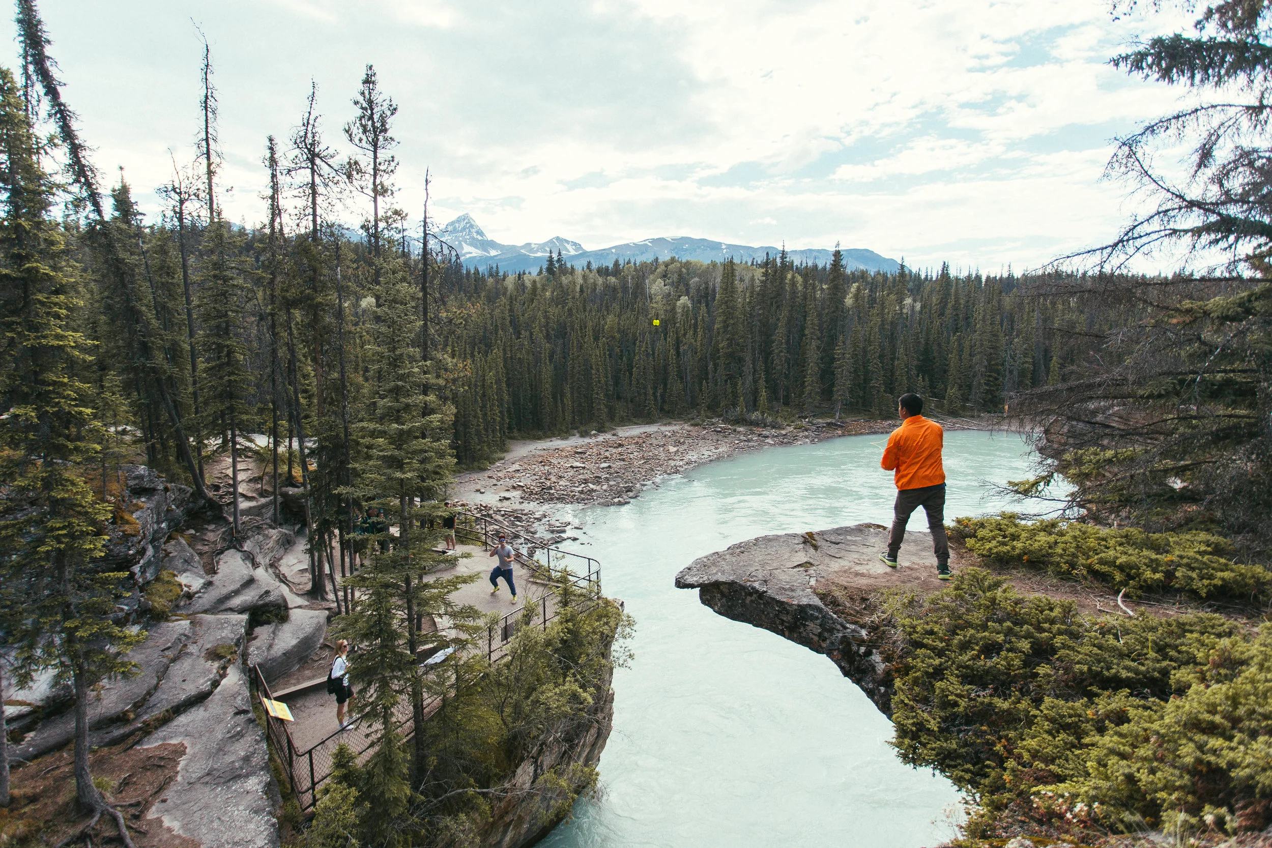 LAUNCHING A YOYO FROM ONE END OF A RIVER TO ANOTHER. 