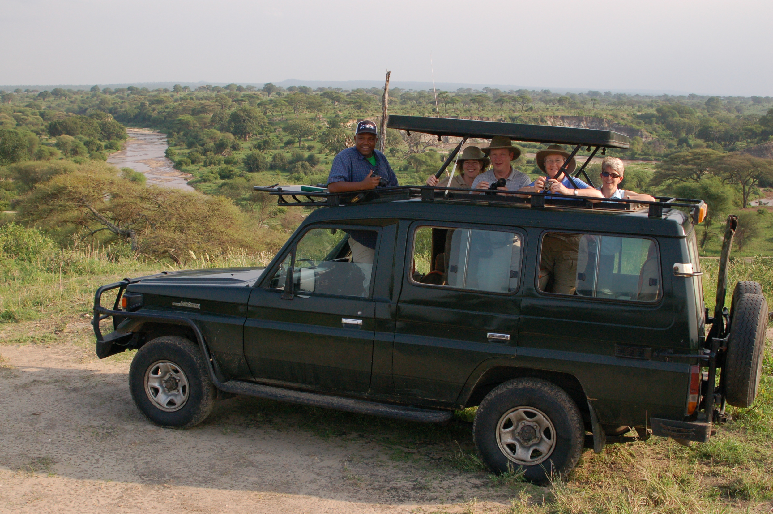 Green Land Rover and group.JPG