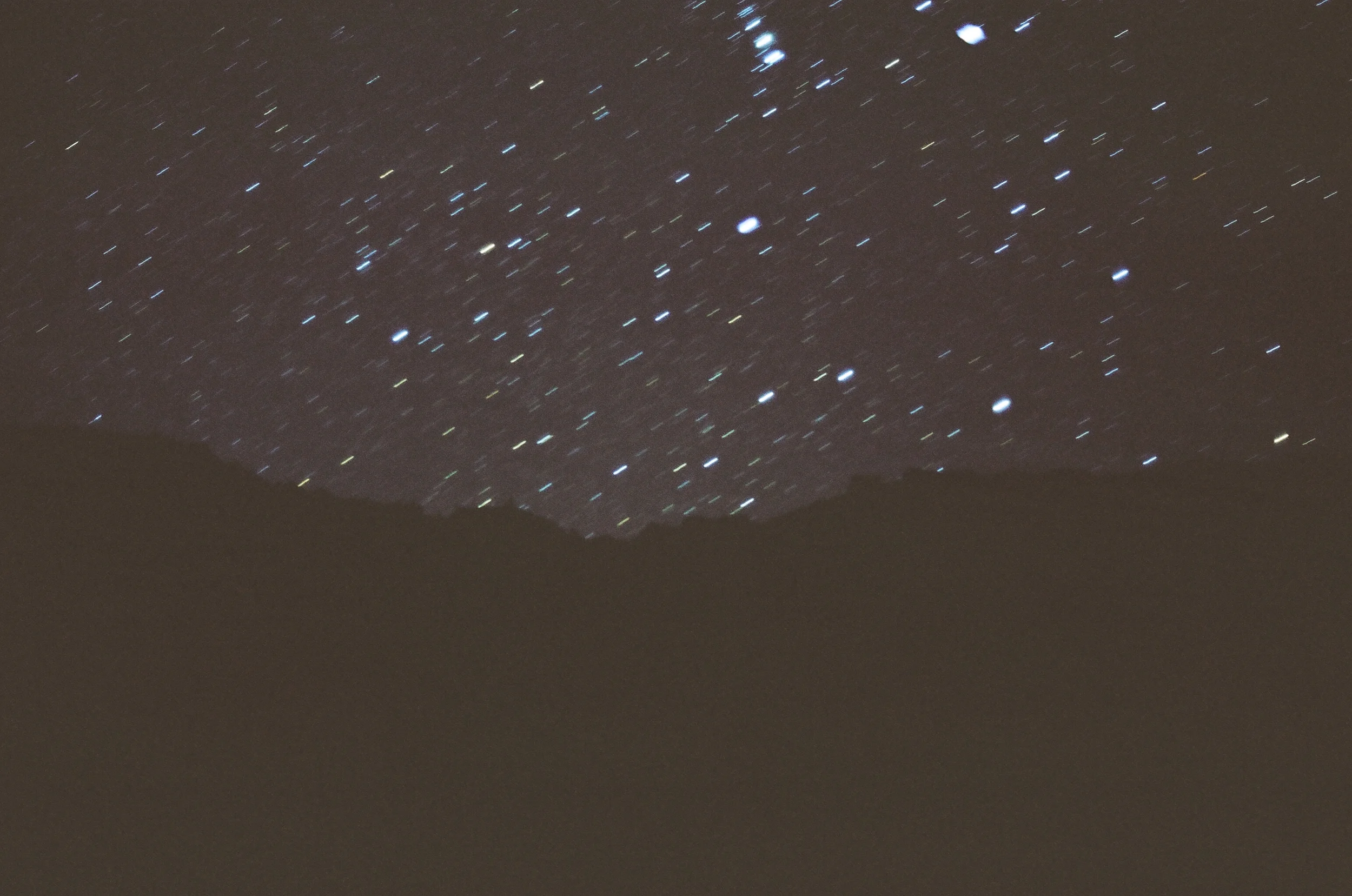 Expose the sky on film for too long, and the exposure captures the movement of the Earth and stars