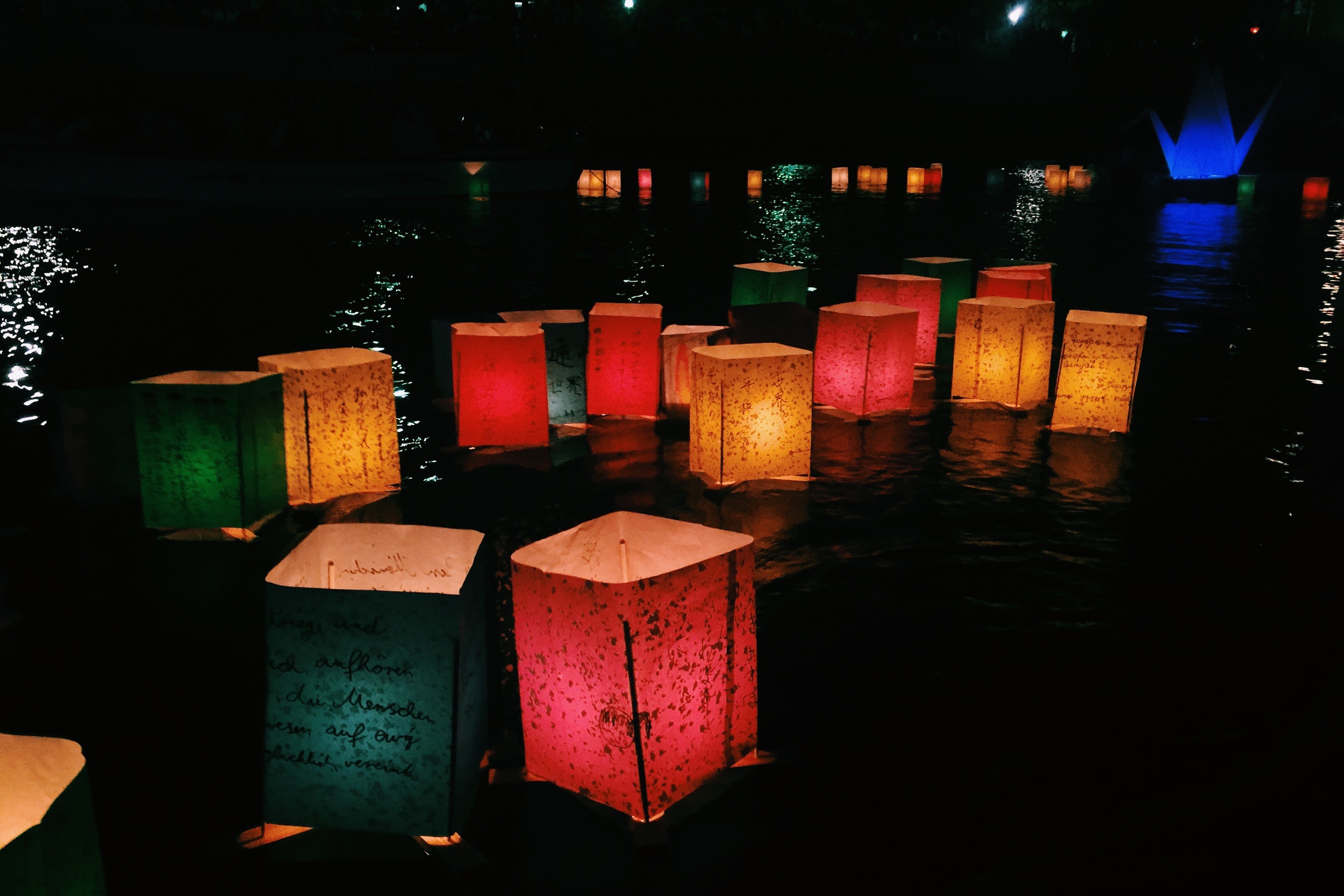 The sun sets, the cicadas quiet, and the lanterns come out