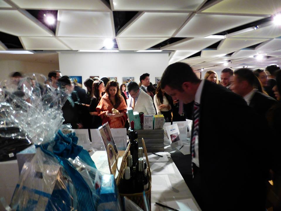 Guests at the Silent Auction display