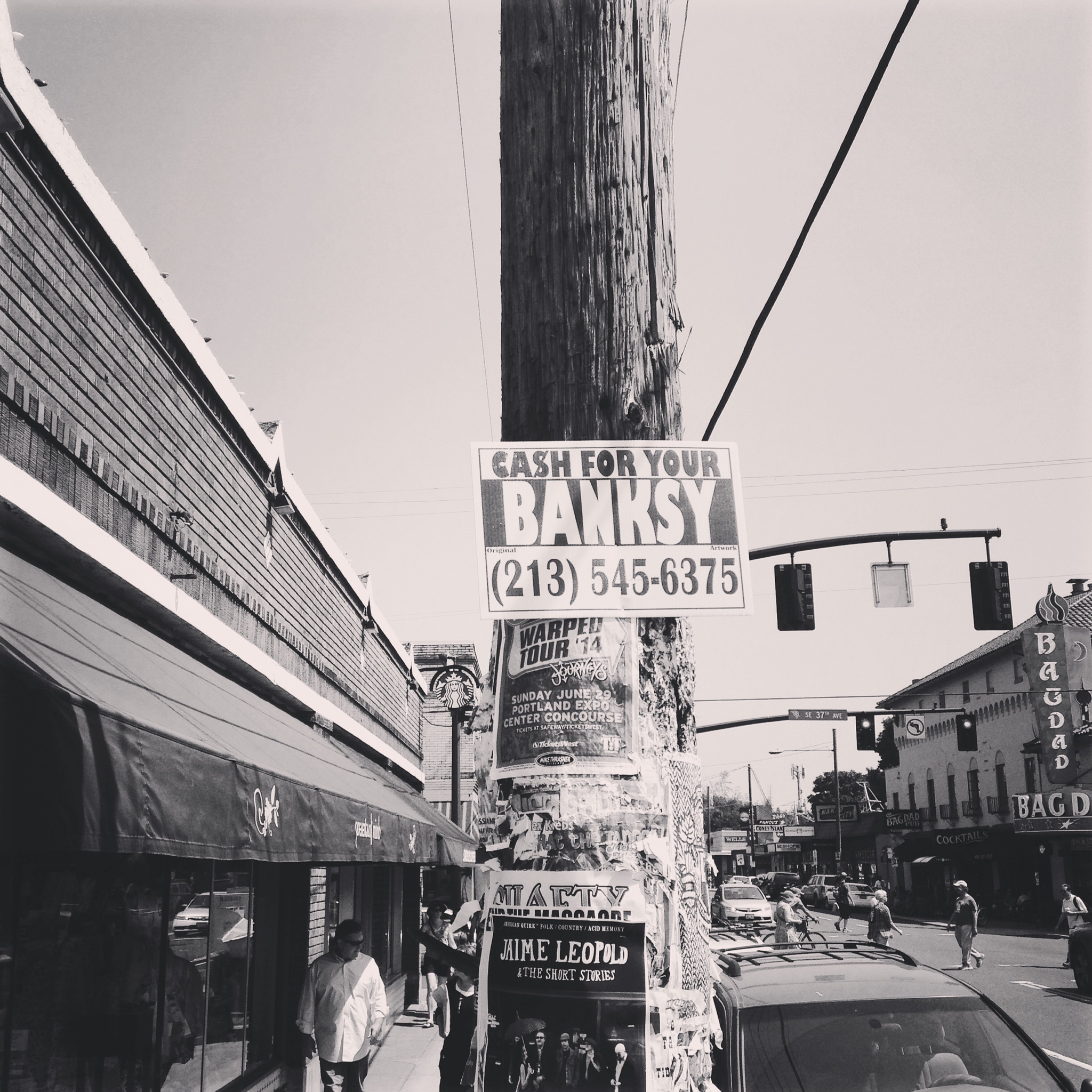 Cash for your Banksy Installation in Portland, OR by Mad One.