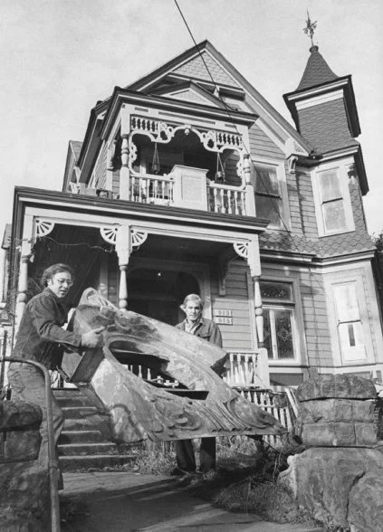 Ben & Jerry carrying a salvaged piece of the old St Mary's Academy.