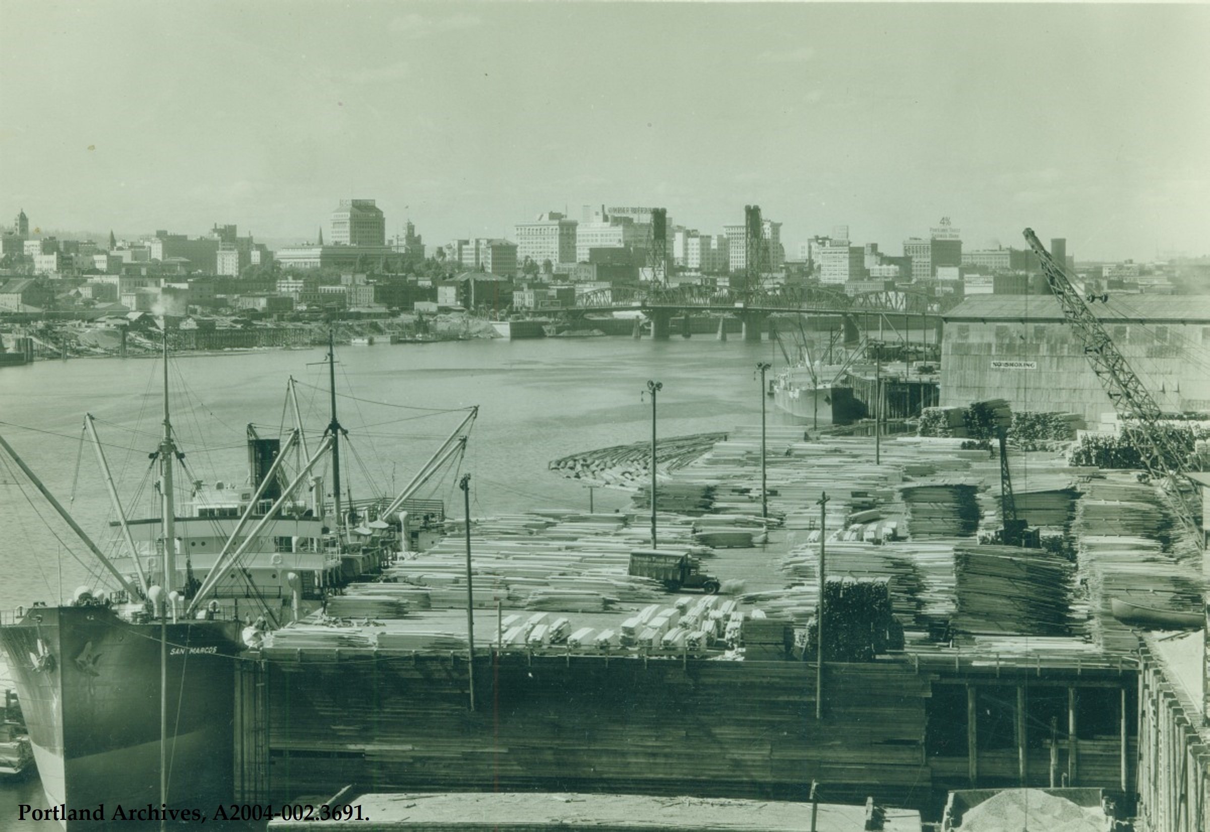 1 - Lumber - Auditor s Historical Records - Inman - Poulsen Lumber dock and view of downtown Portland 1937.JPG