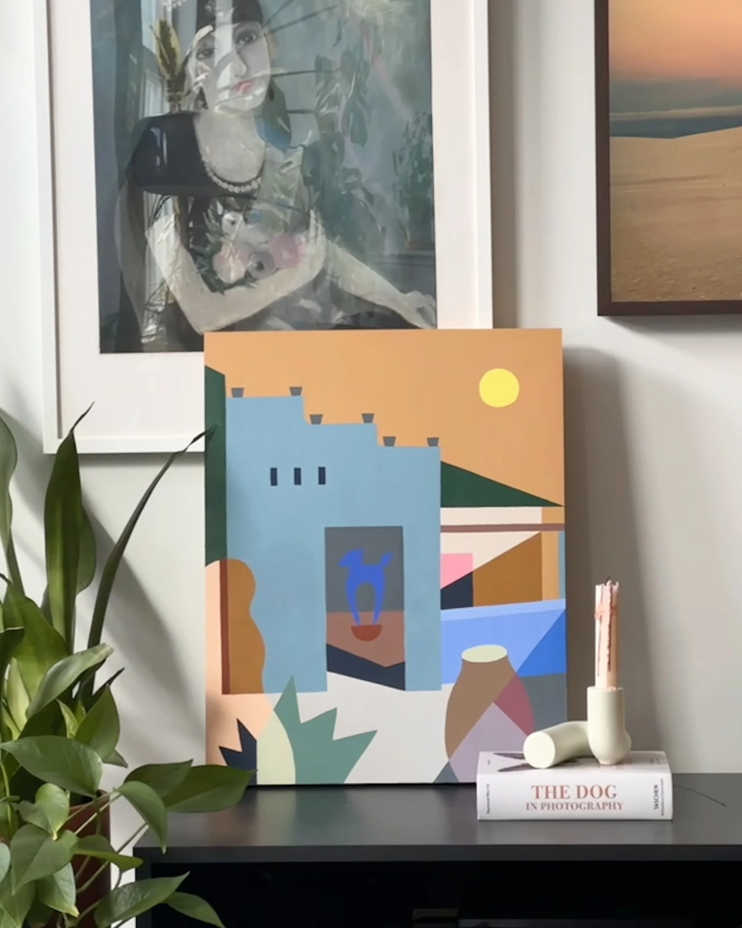Annie-pei's Chimayo painting leaning against a living room wall.