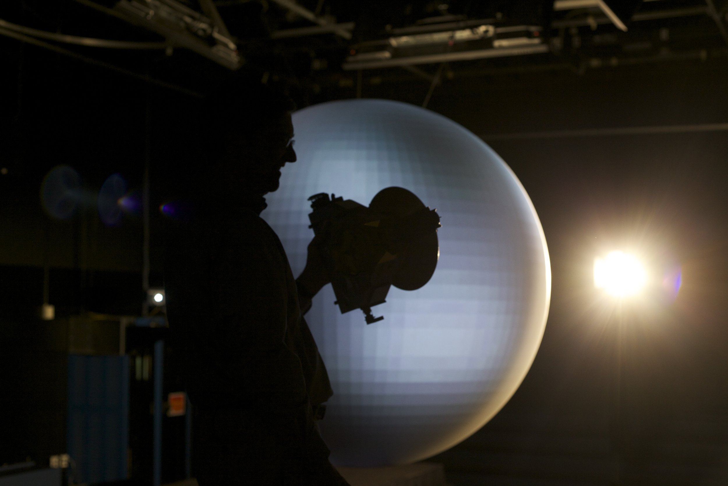 Hal Weaver, silhouetted on set with New Horizons, Goddard Space Flight Center, Greenbelt MD, July 2015