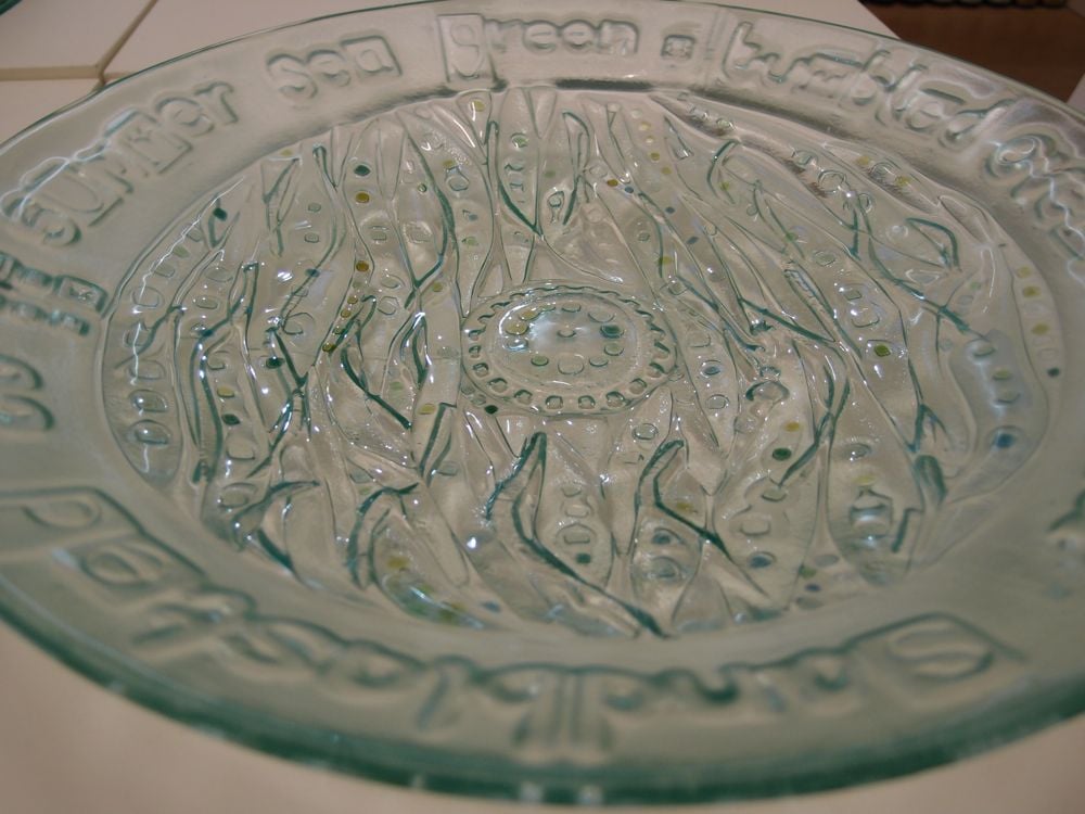 Sea Glass bowl with Fiona Macrae's words "tumbled over and over, sand blasted to summer sea green"