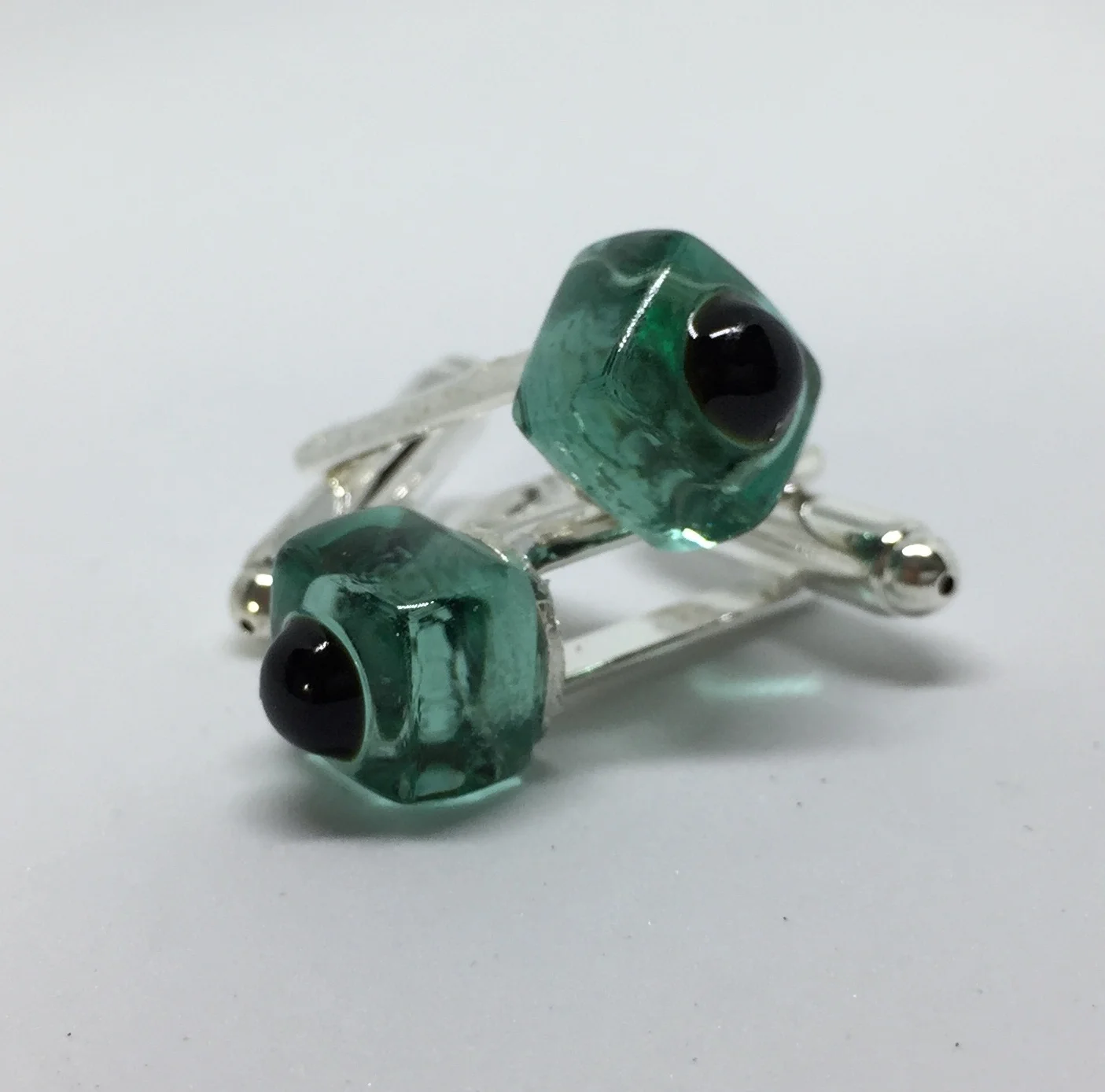 cuff black on seagreen.jpeg