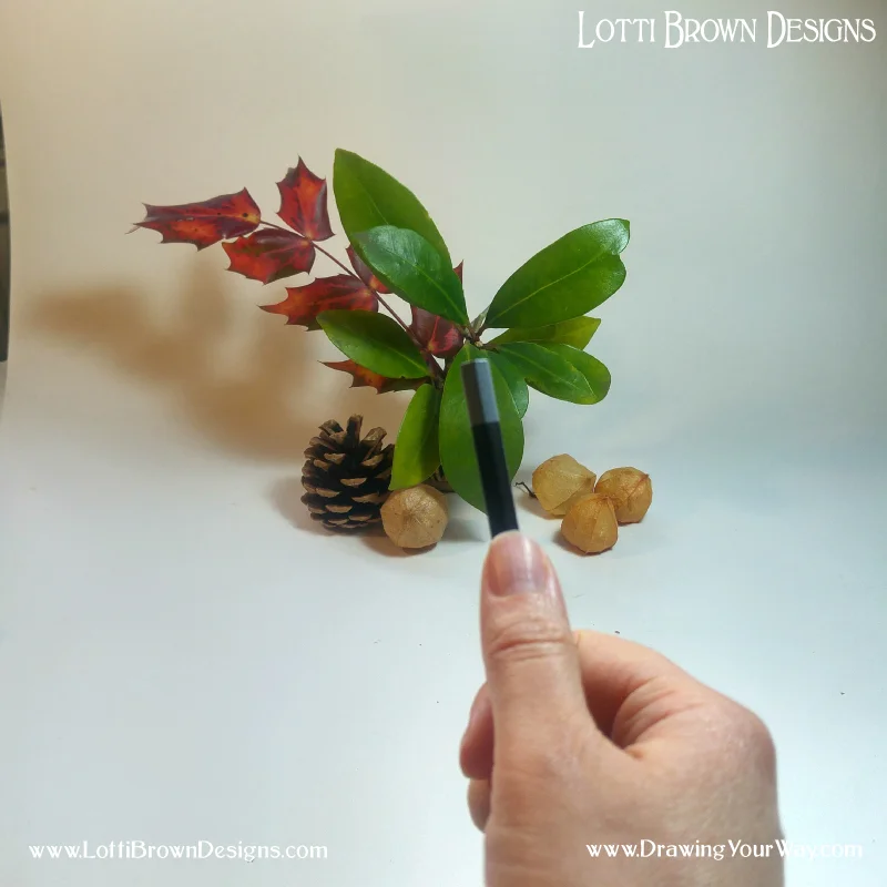 Hold your pencil at the same angle then bring it across to your drawing…