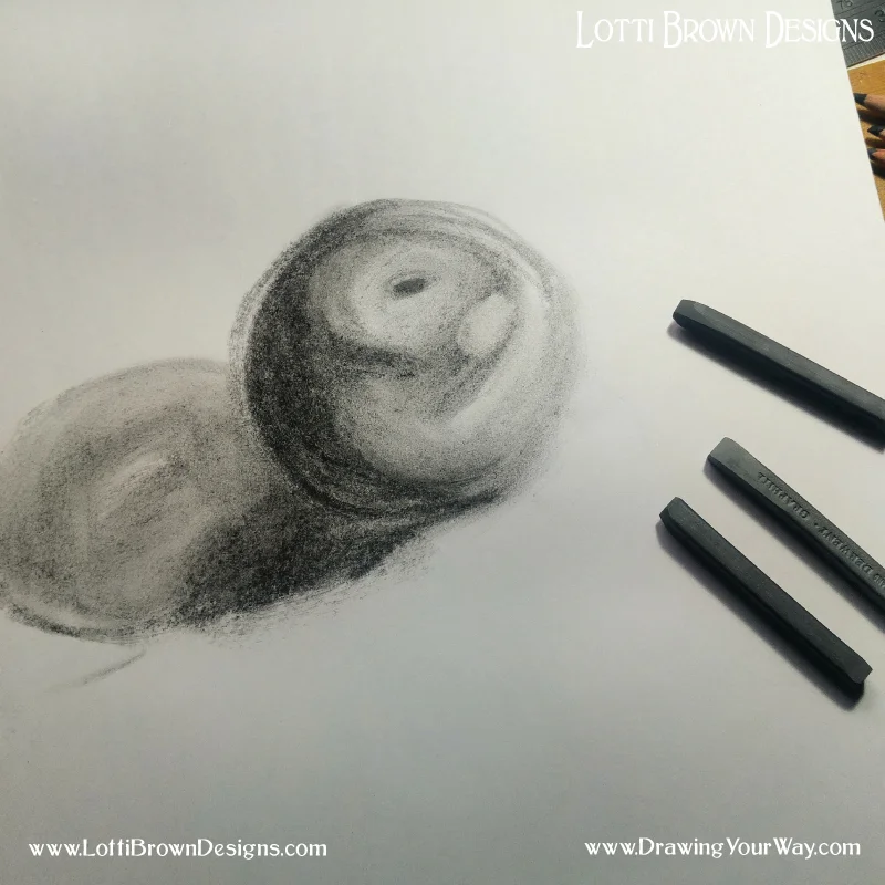 Exploring the shadows on a fruit with graphite sticks