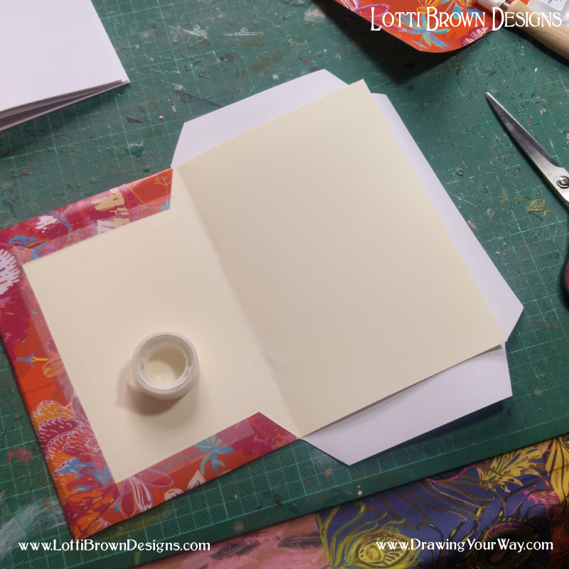 Decorating the sketchbook cover simply by covering in a colourful gift wrap or wallpaper.