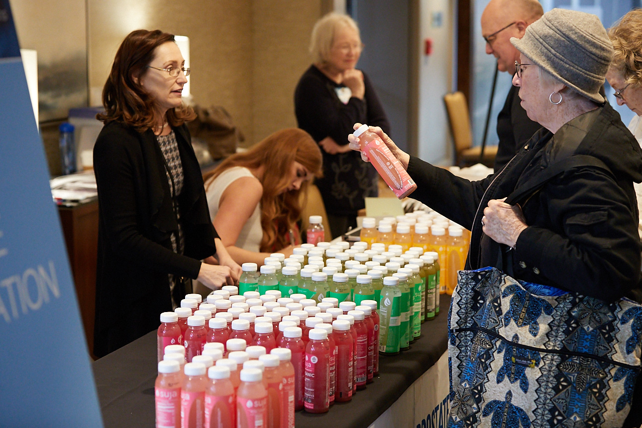 Free healthy drinks at the PCRI table donated from Suja Juice.